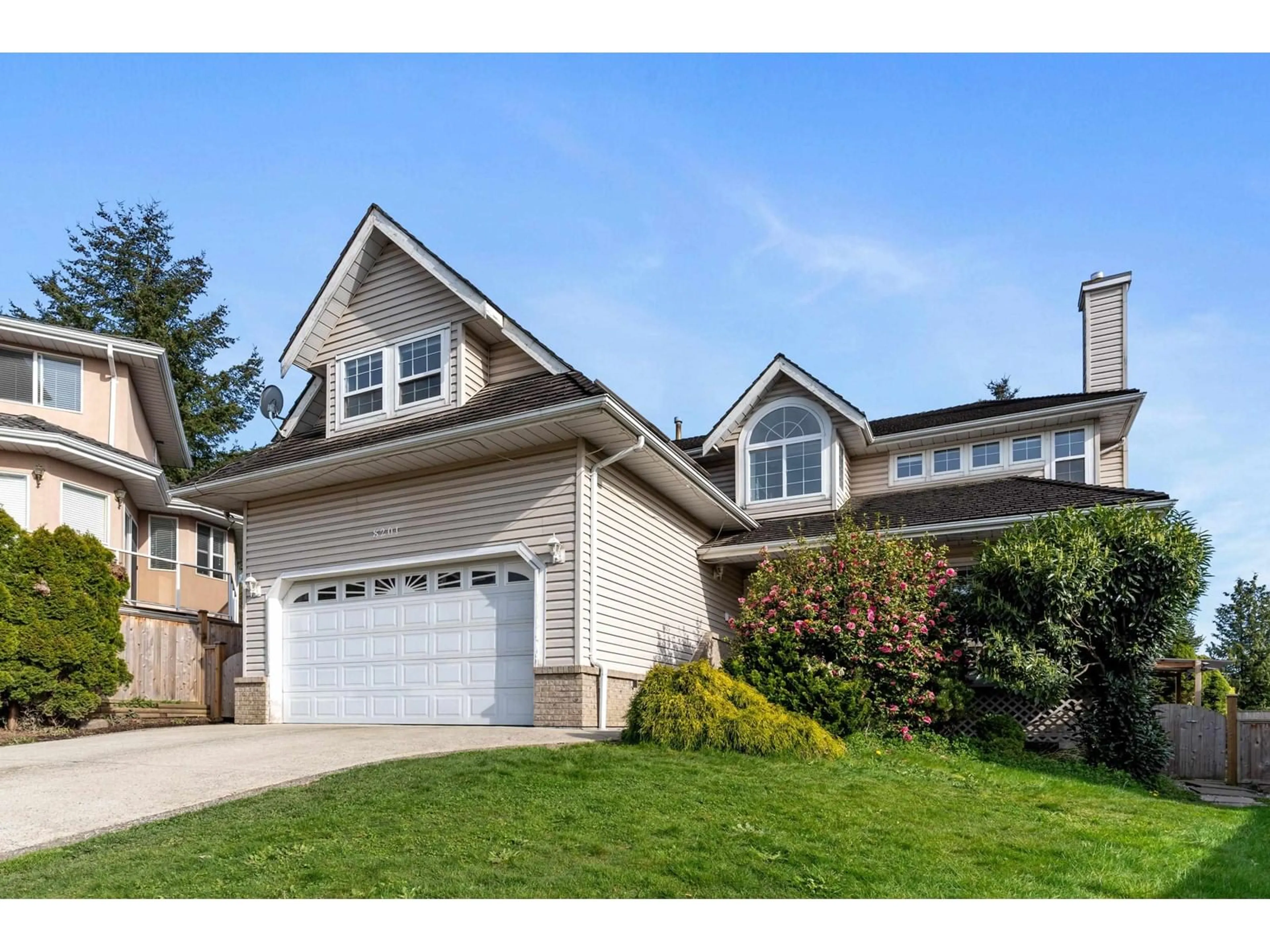 Home with vinyl exterior material, street for 8201 NECHAKO, Delta British Columbia V4C3X2