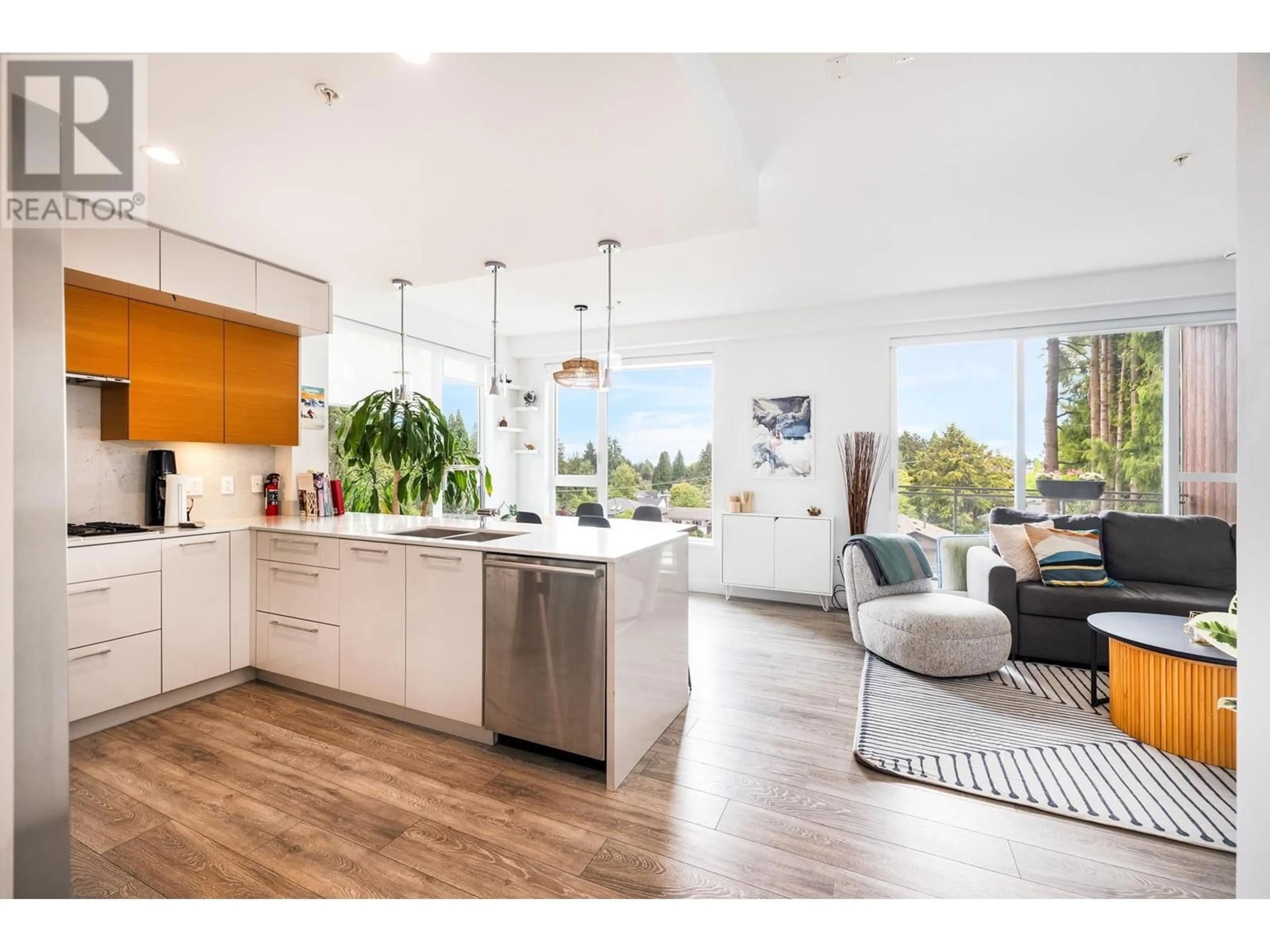 Open concept kitchen, wood/laminate floor for 307 - 1327 DRAYCOTT ROAD, North Vancouver British Columbia V7J1W1