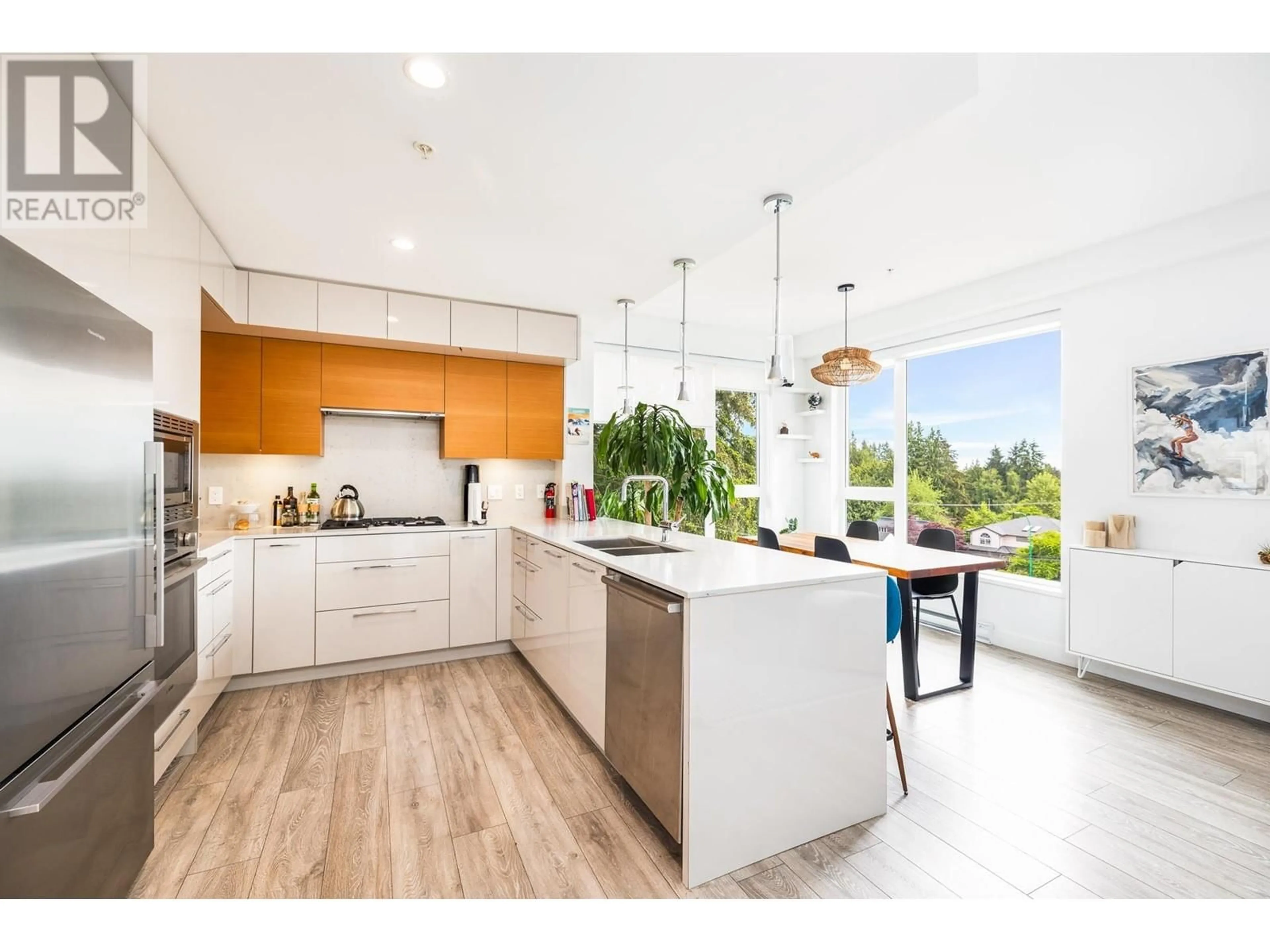 Open concept kitchen, unknown for 307 - 1327 DRAYCOTT ROAD, North Vancouver British Columbia V7J1W1