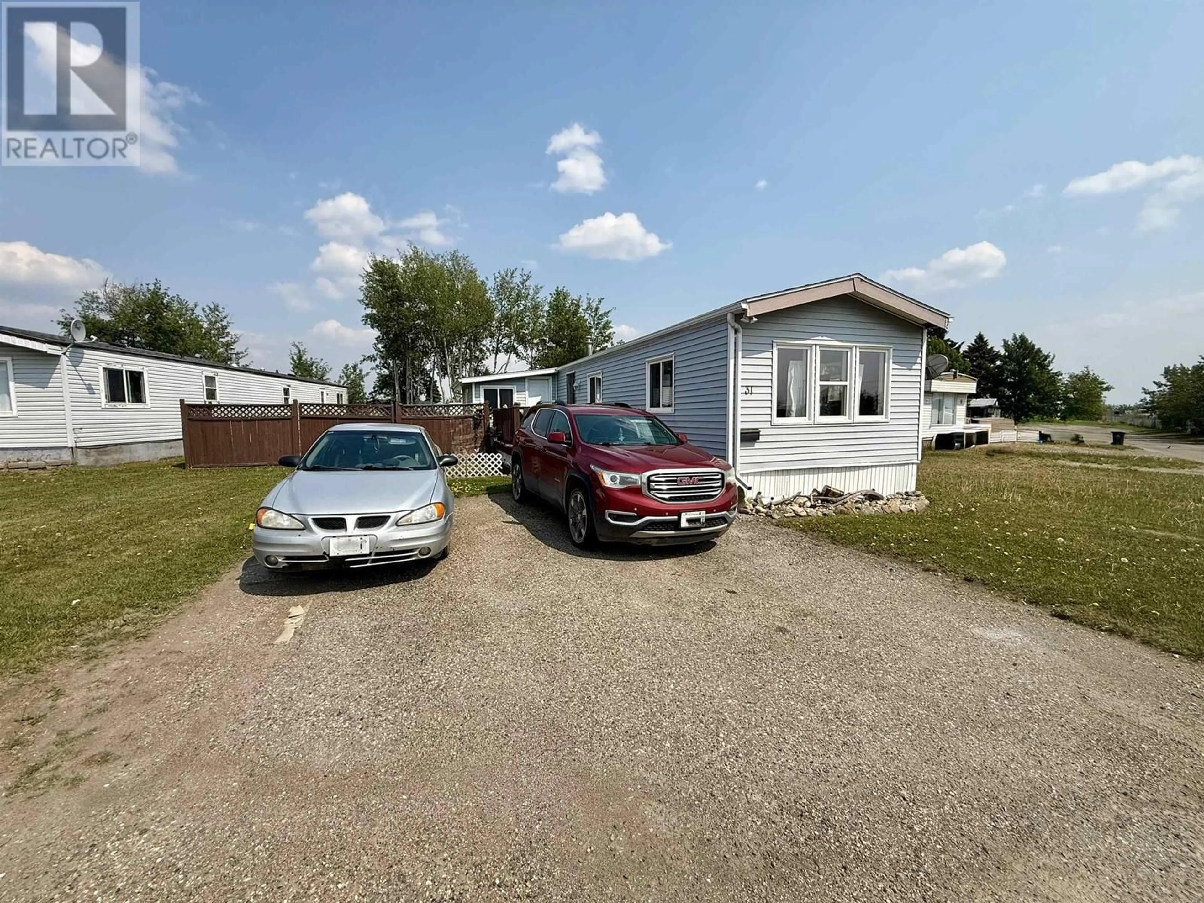 A pic from outside/outdoor area/front of a property/back of a property/a pic from drone, street for #31 8420 ALASKA ROAD, Fort St. John British Columbia V1J4J6