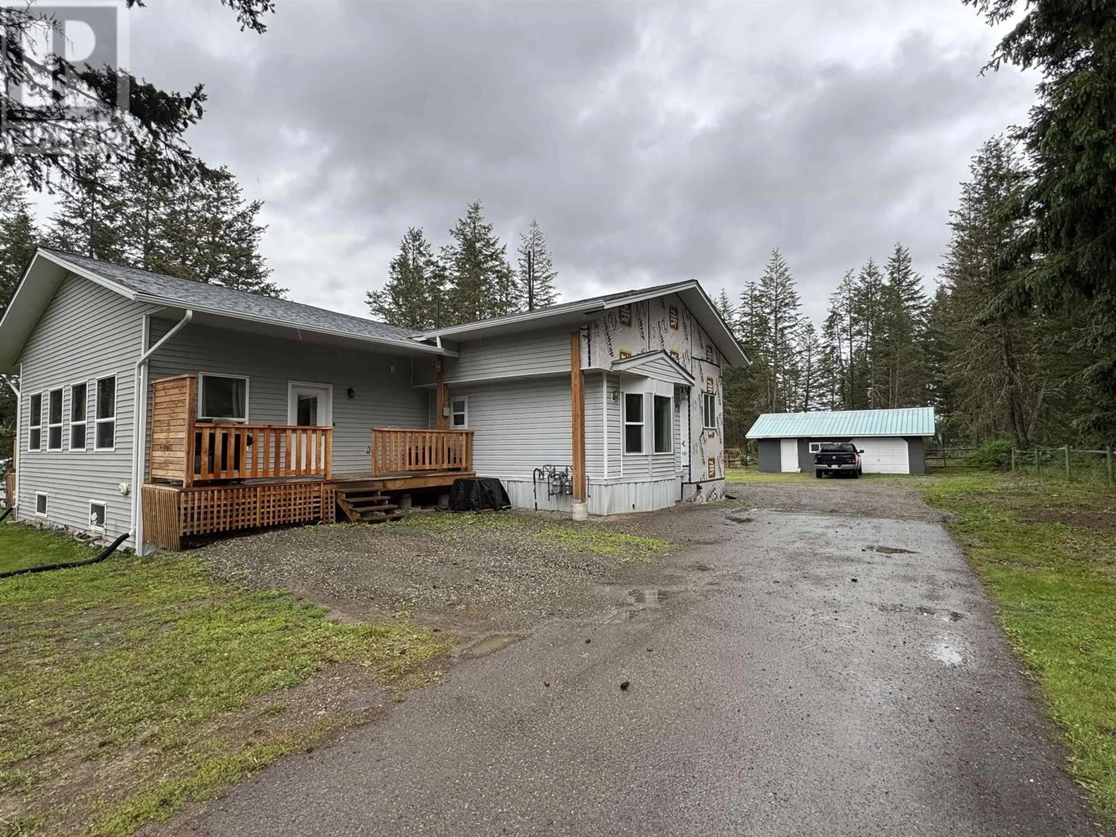 A pic from outside/outdoor area/front of a property/back of a property/a pic from drone, unknown for 3078 HEINIE PLACE, 150 Mile House British Columbia V0K2G0