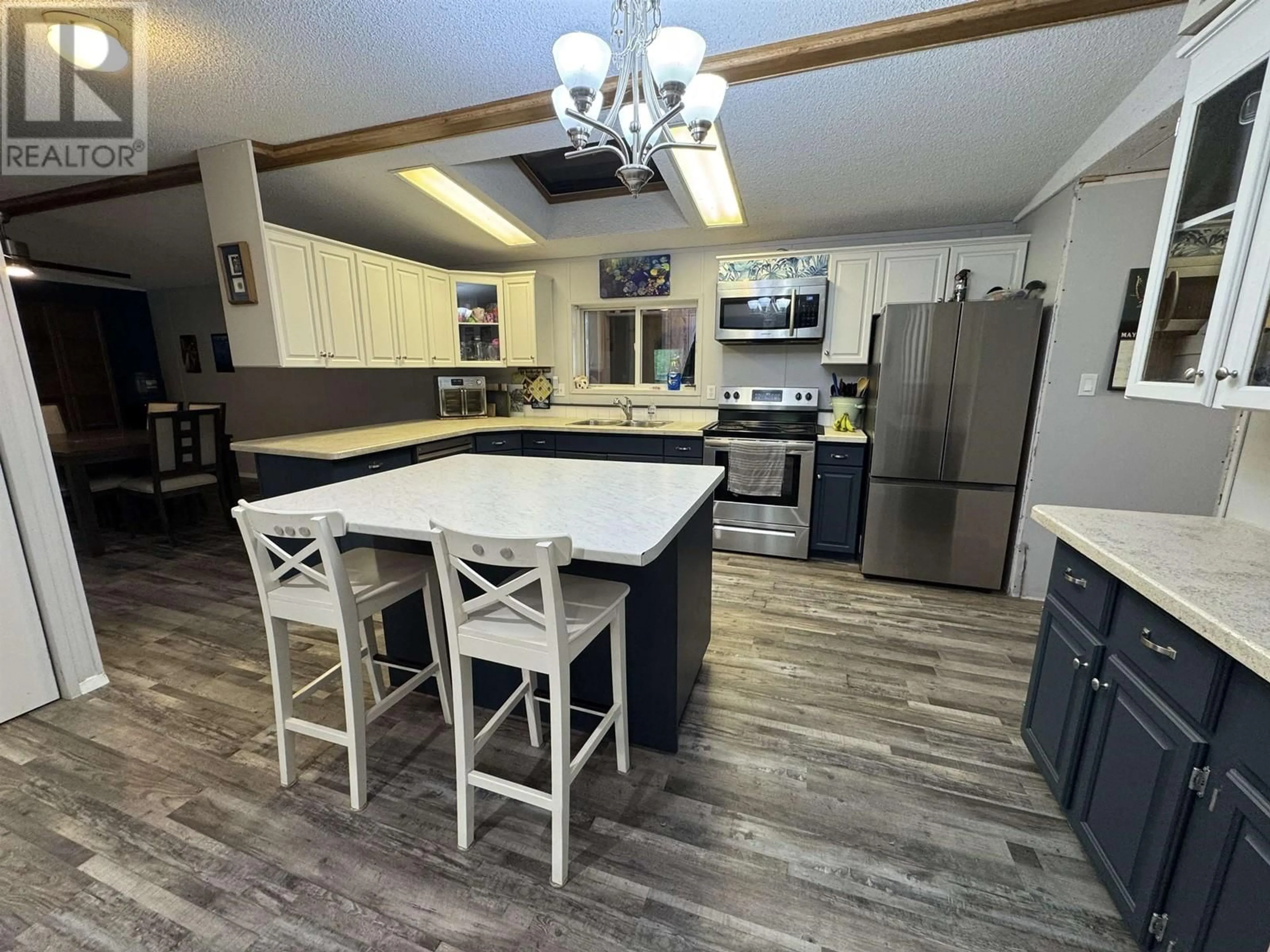 Open concept kitchen, unknown for 3078 HEINIE PLACE, 150 Mile House British Columbia V0K2G0