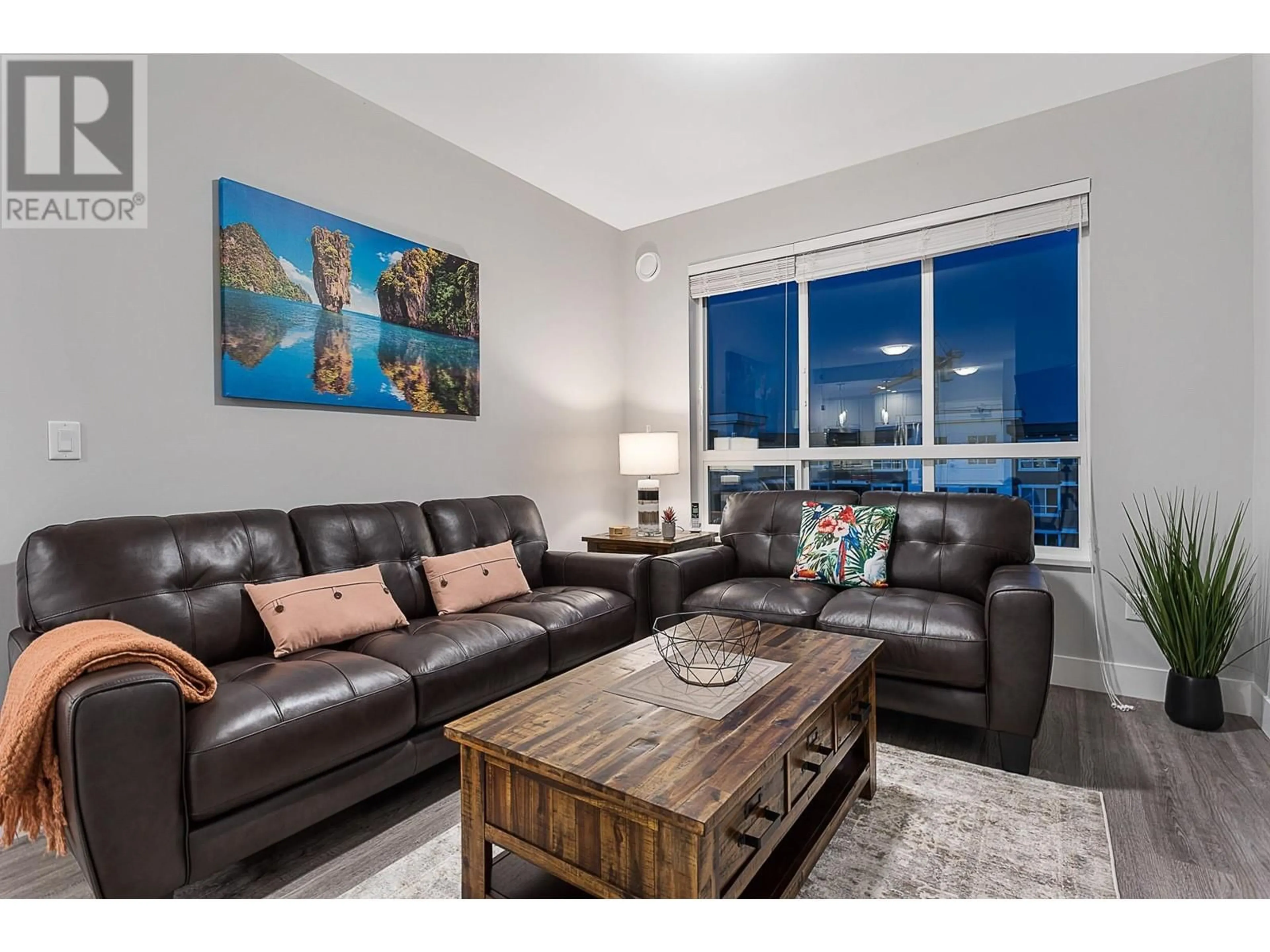 Living room with furniture, wood/laminate floor for 4617 - 2180 KELLY AVENUE, Port Coquitlam British Columbia V3C0L1