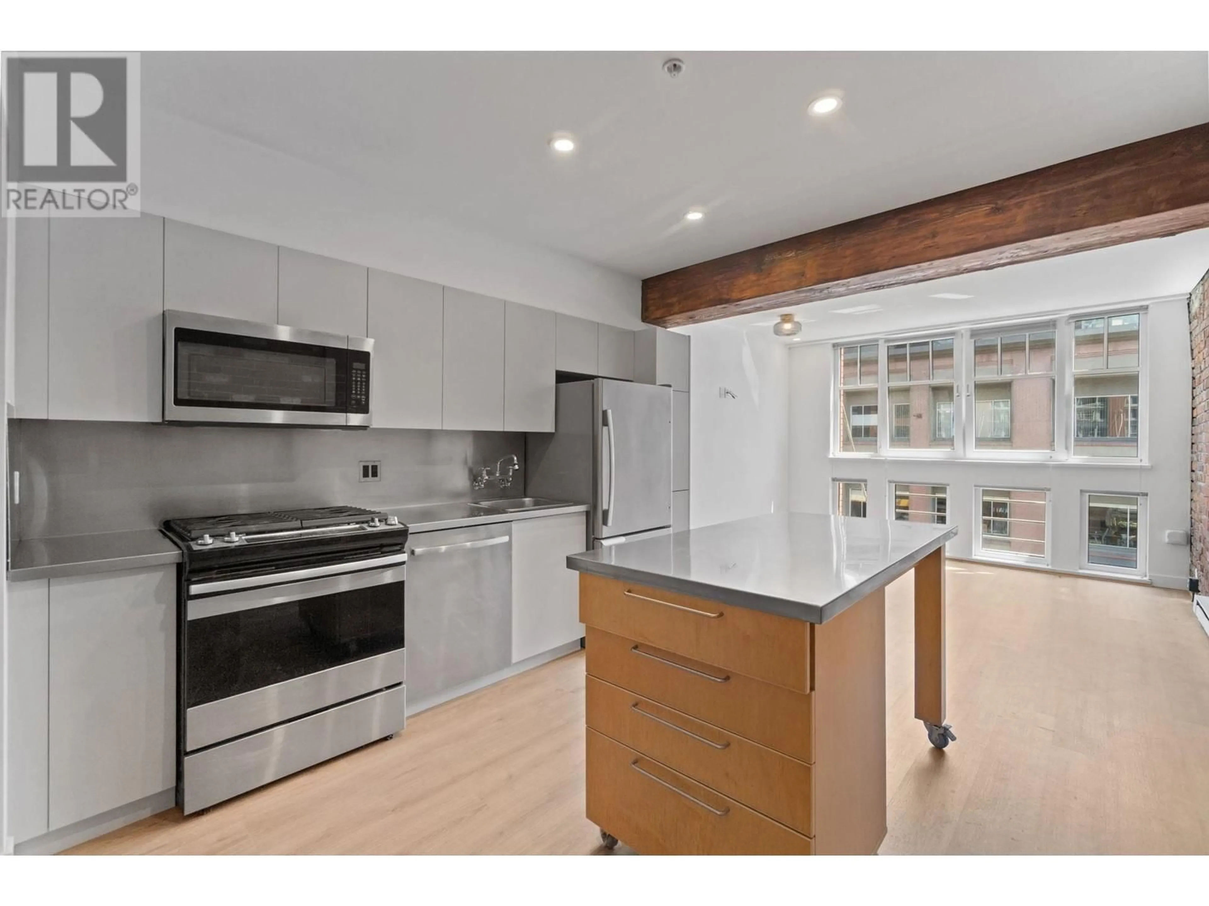 Open concept kitchen, unknown for 308 - 1072 HAMILTON STREET, Vancouver British Columbia V6B2R9