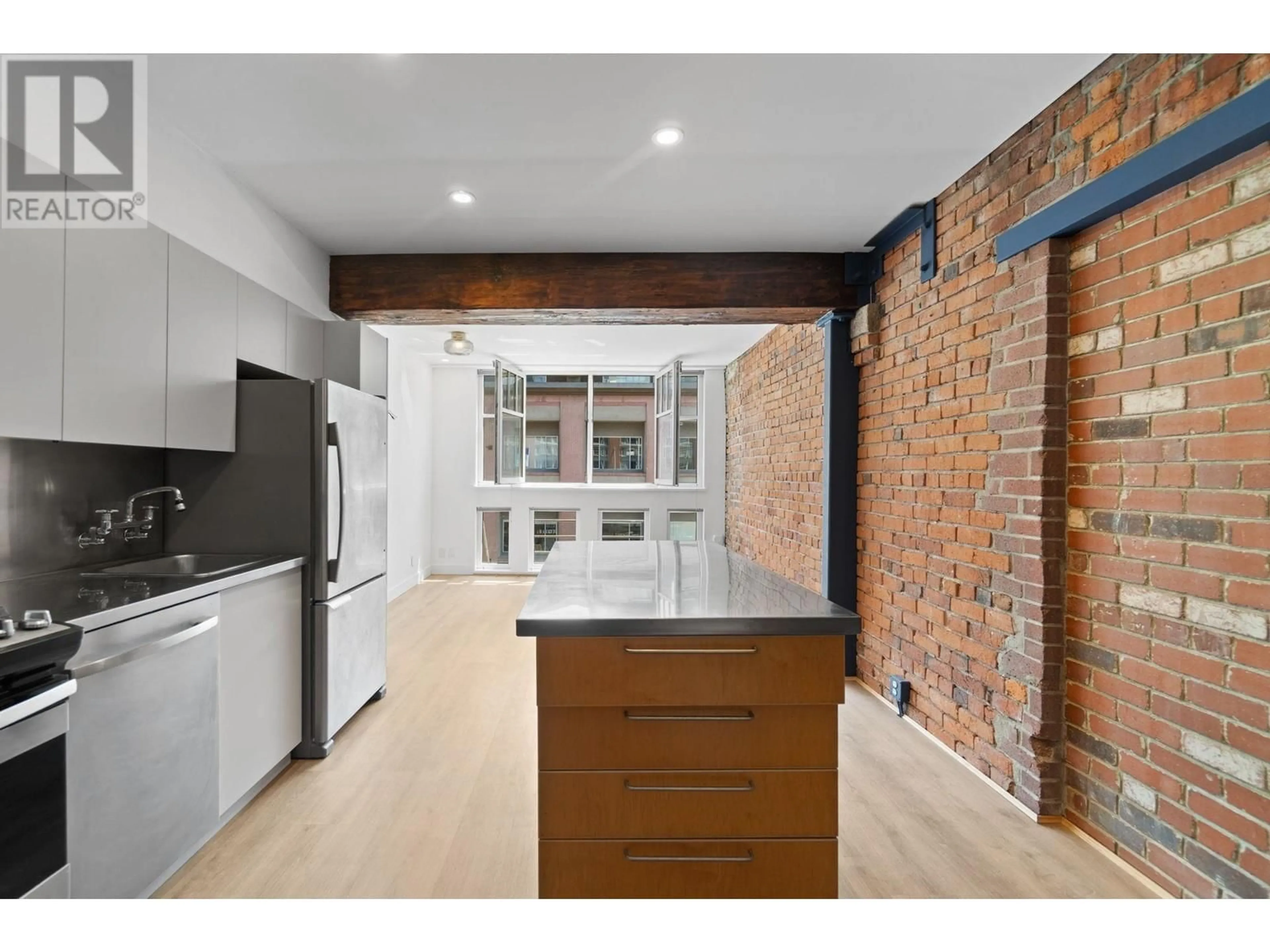 Open concept kitchen, unknown for 308 - 1072 HAMILTON STREET, Vancouver British Columbia V6B2R9