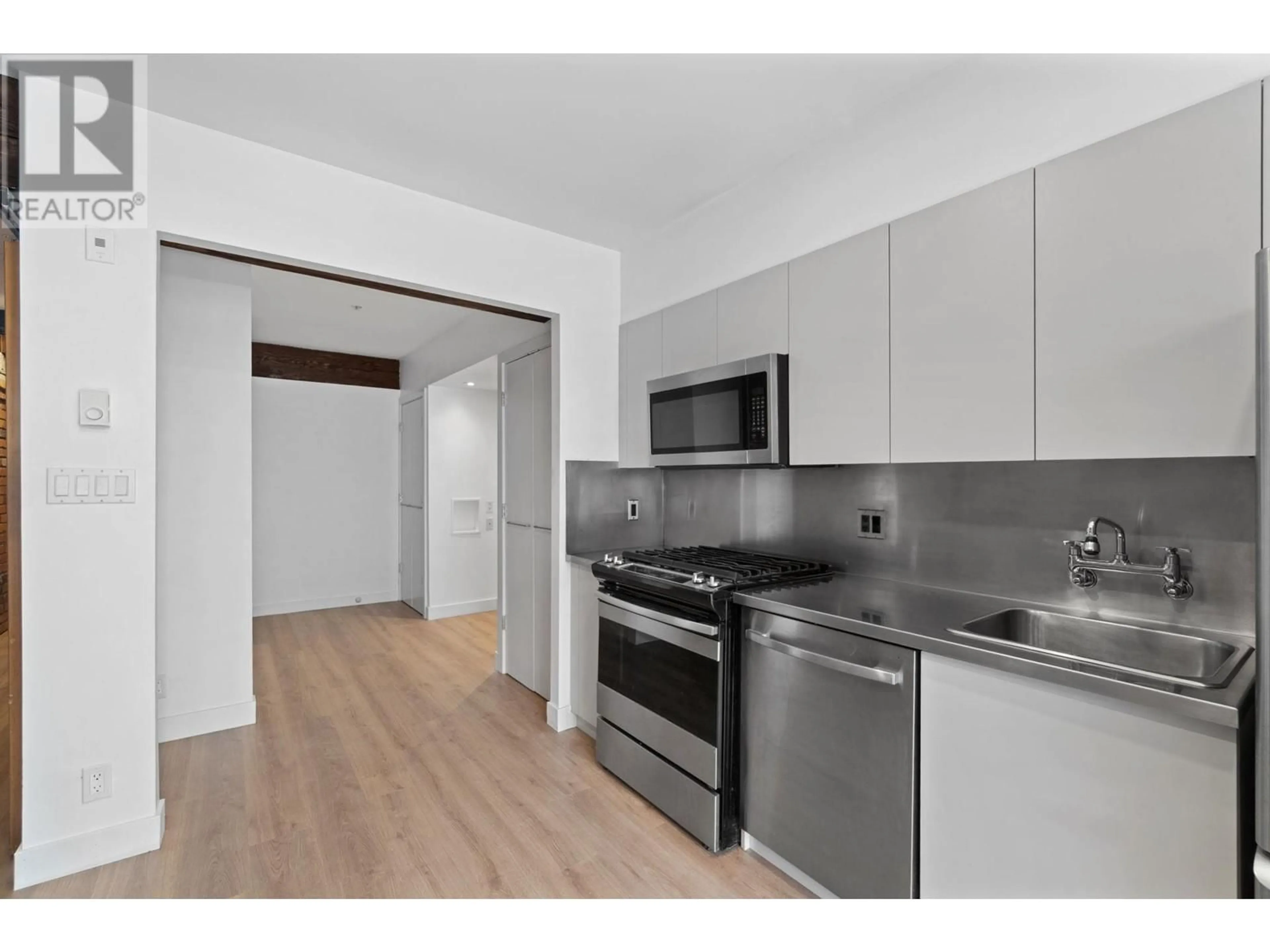 Standard kitchen, wood/laminate floor for 308 - 1072 HAMILTON STREET, Vancouver British Columbia V6B2R9