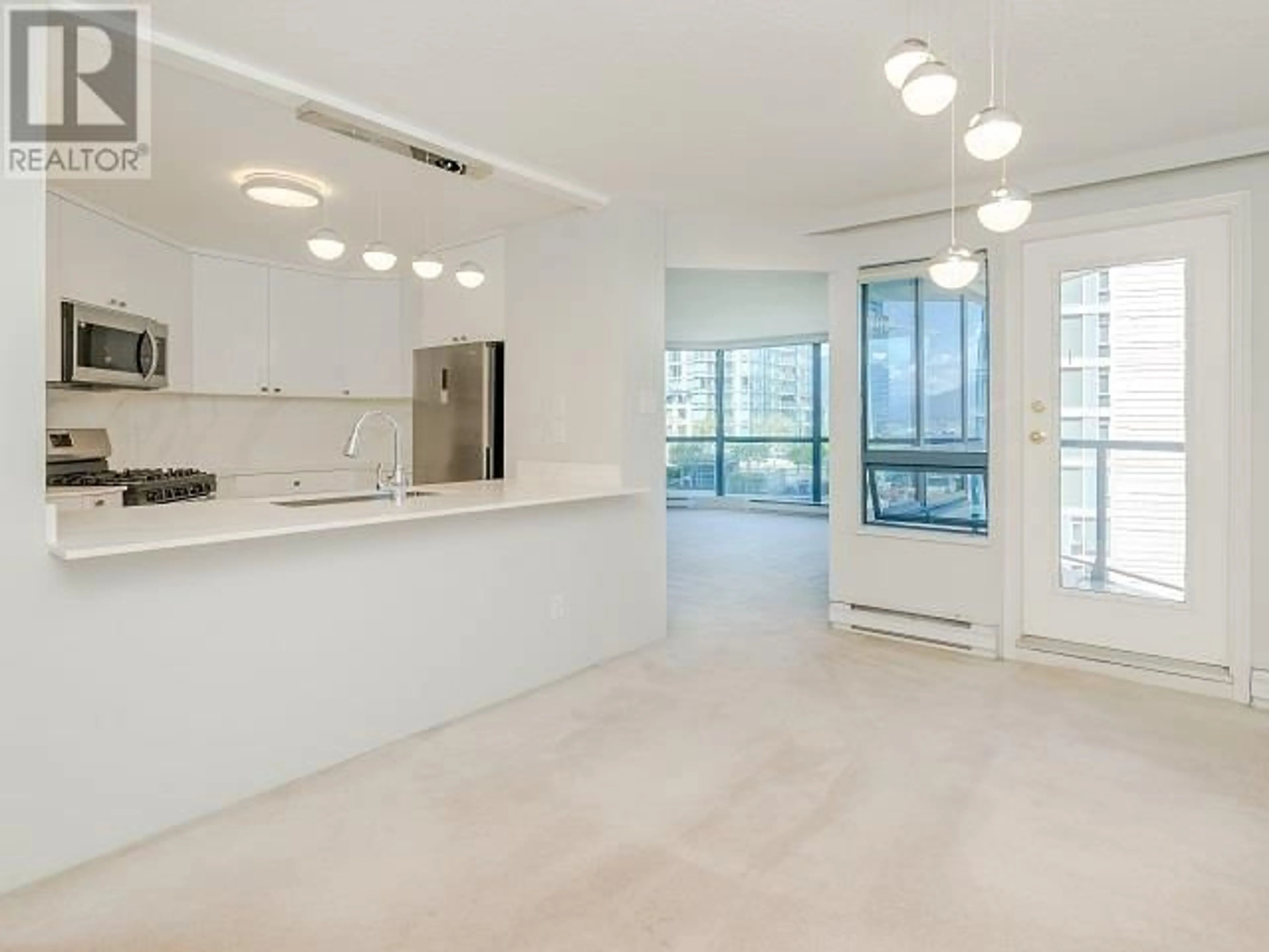 Open concept kitchen, unknown for 303 - 1415 GEORGIA STREET, Vancouver British Columbia V6G3C8