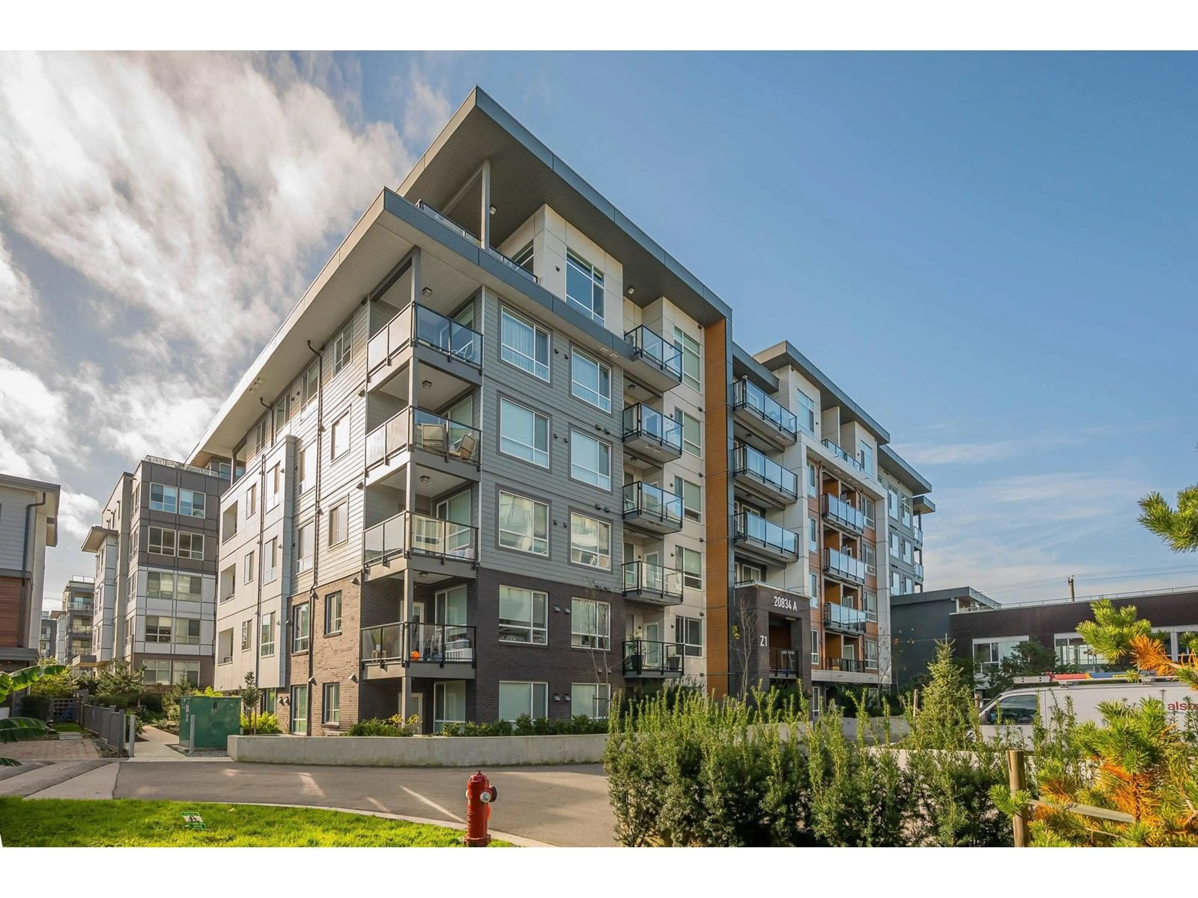 A pic from outside/outdoor area/front of a property/back of a property/a pic from drone, building for A401 - 20834 80, Langley British Columbia V2Y3M3