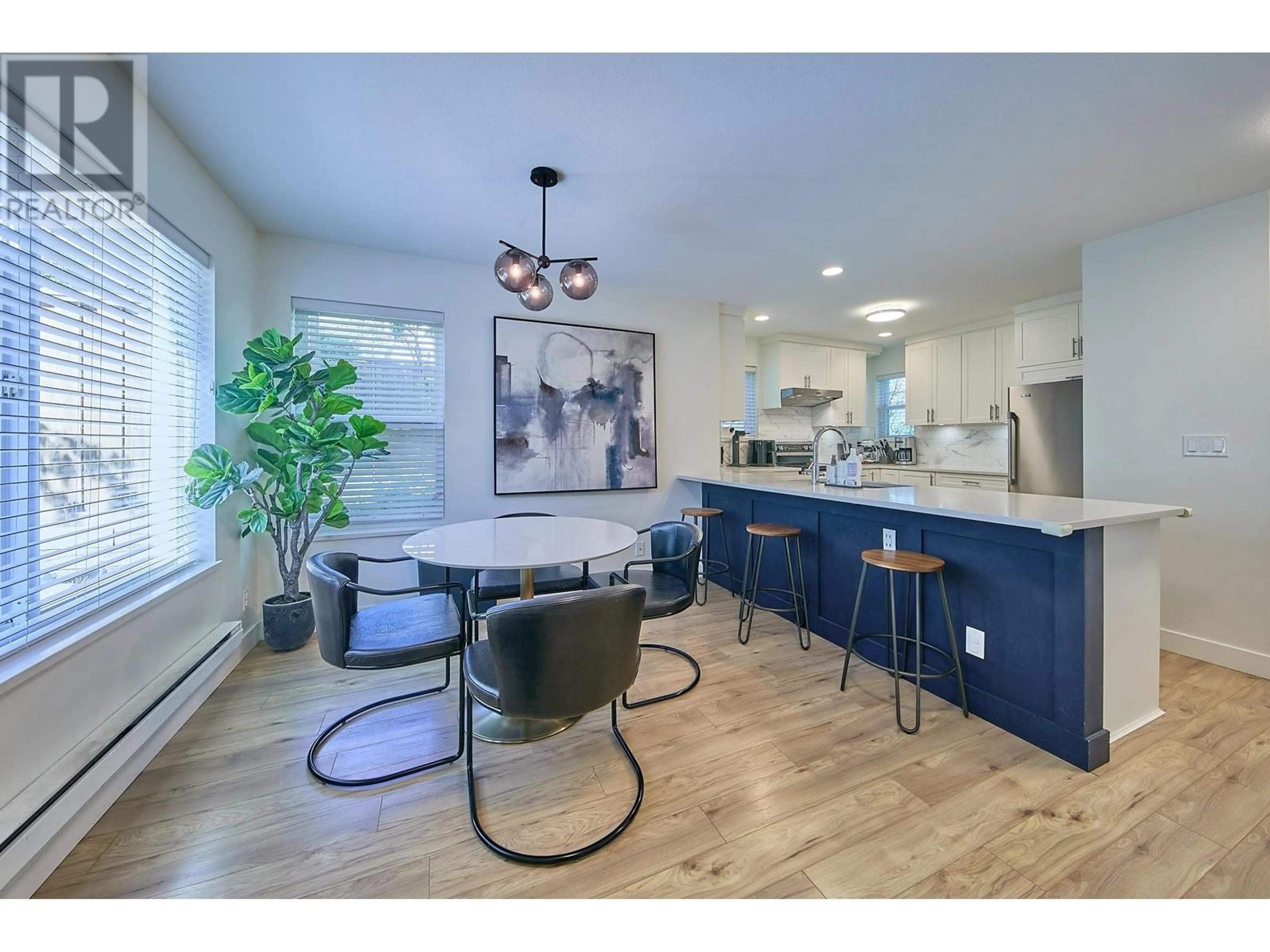 Open concept kitchen, wood/laminate floor for 128 SHORELINE CIRCLE, Port Moody British Columbia V3H5B3