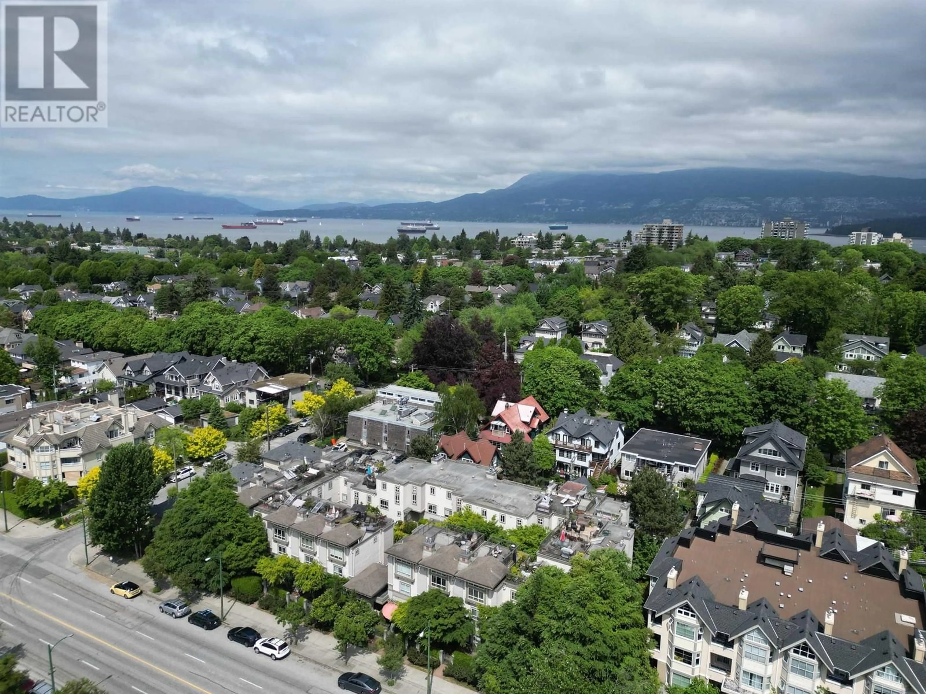 A pic from outside/outdoor area/front of a property/back of a property/a pic from drone, mountain view for 12 - 2375 BROADWAY, Vancouver British Columbia V6K2E6