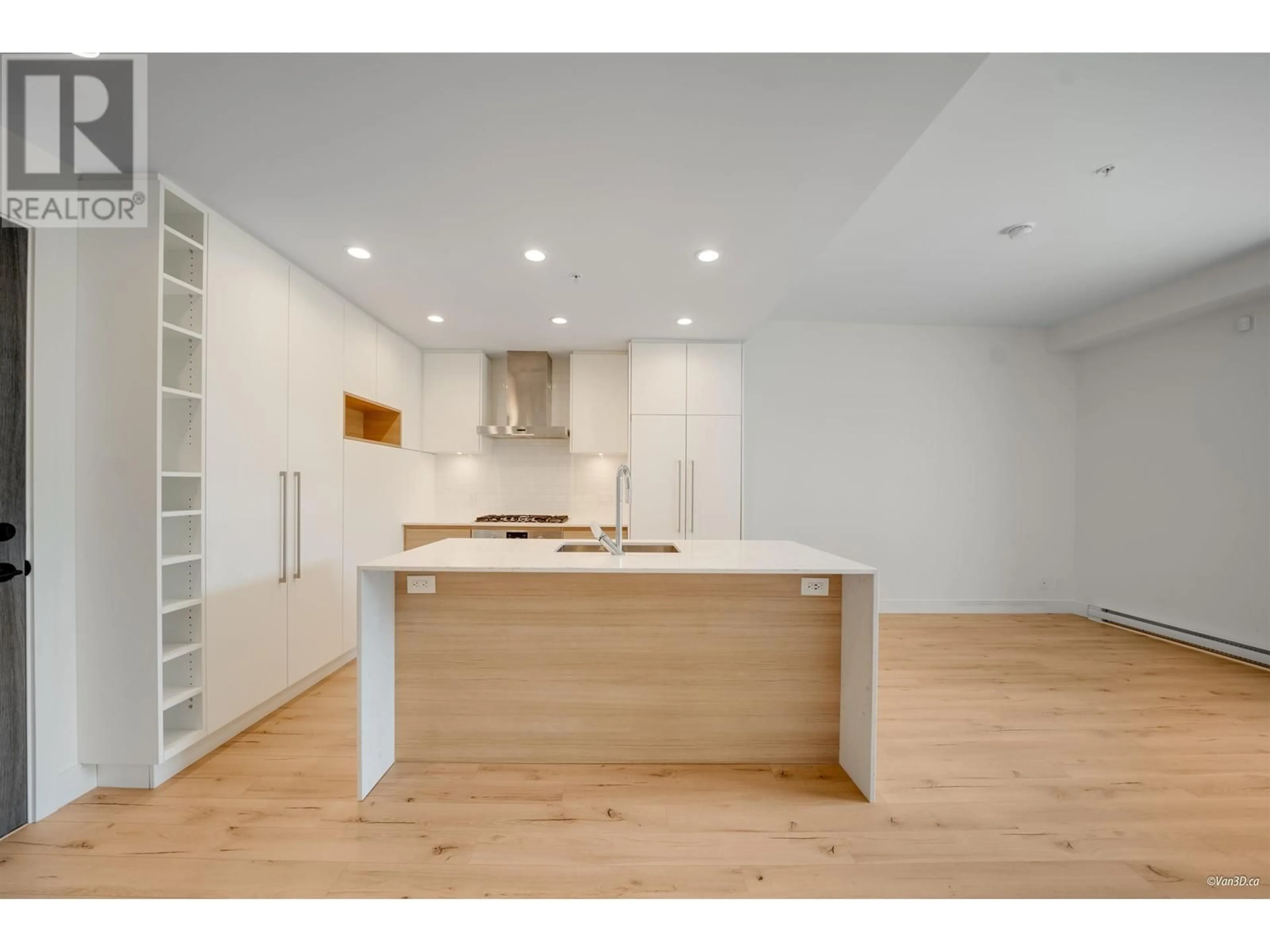Open concept kitchen, wood/laminate floor for 201 - 55 KLAHANIE DRIVE, Port Moody British Columbia V3H0M9