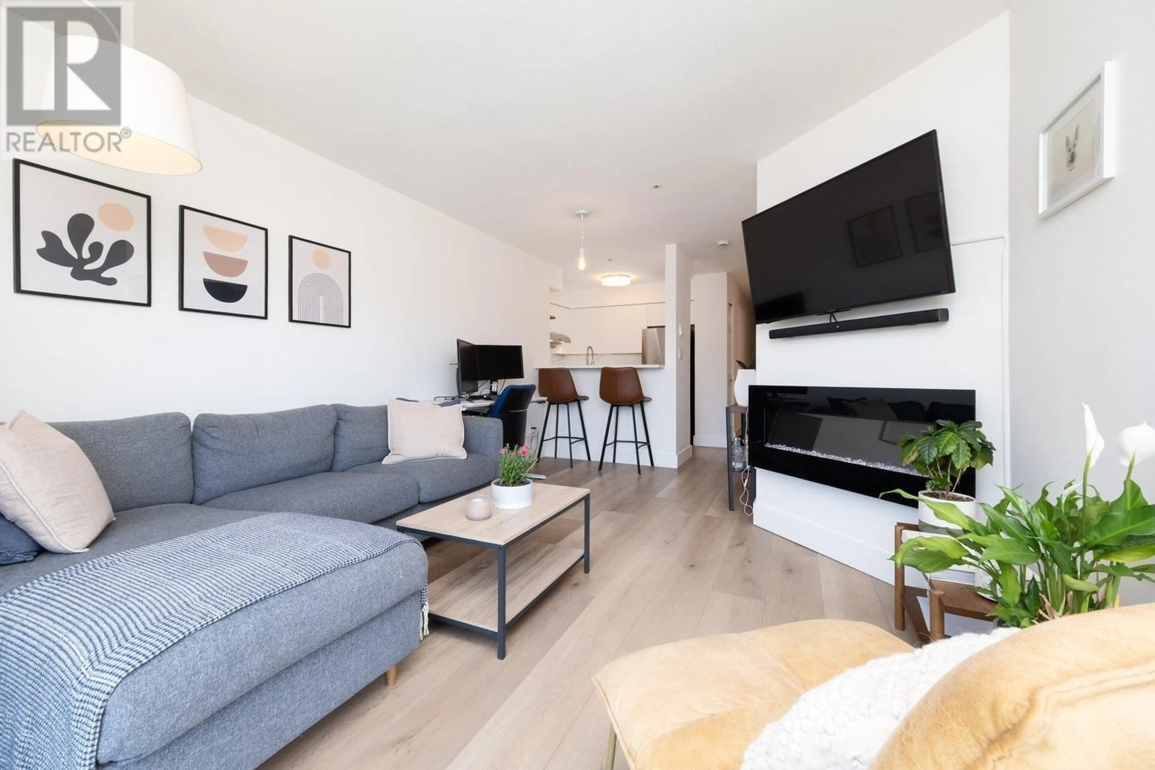 Living room with furniture, unknown for 302 - 3505 BROADWAY, Vancouver British Columbia V6R2B5