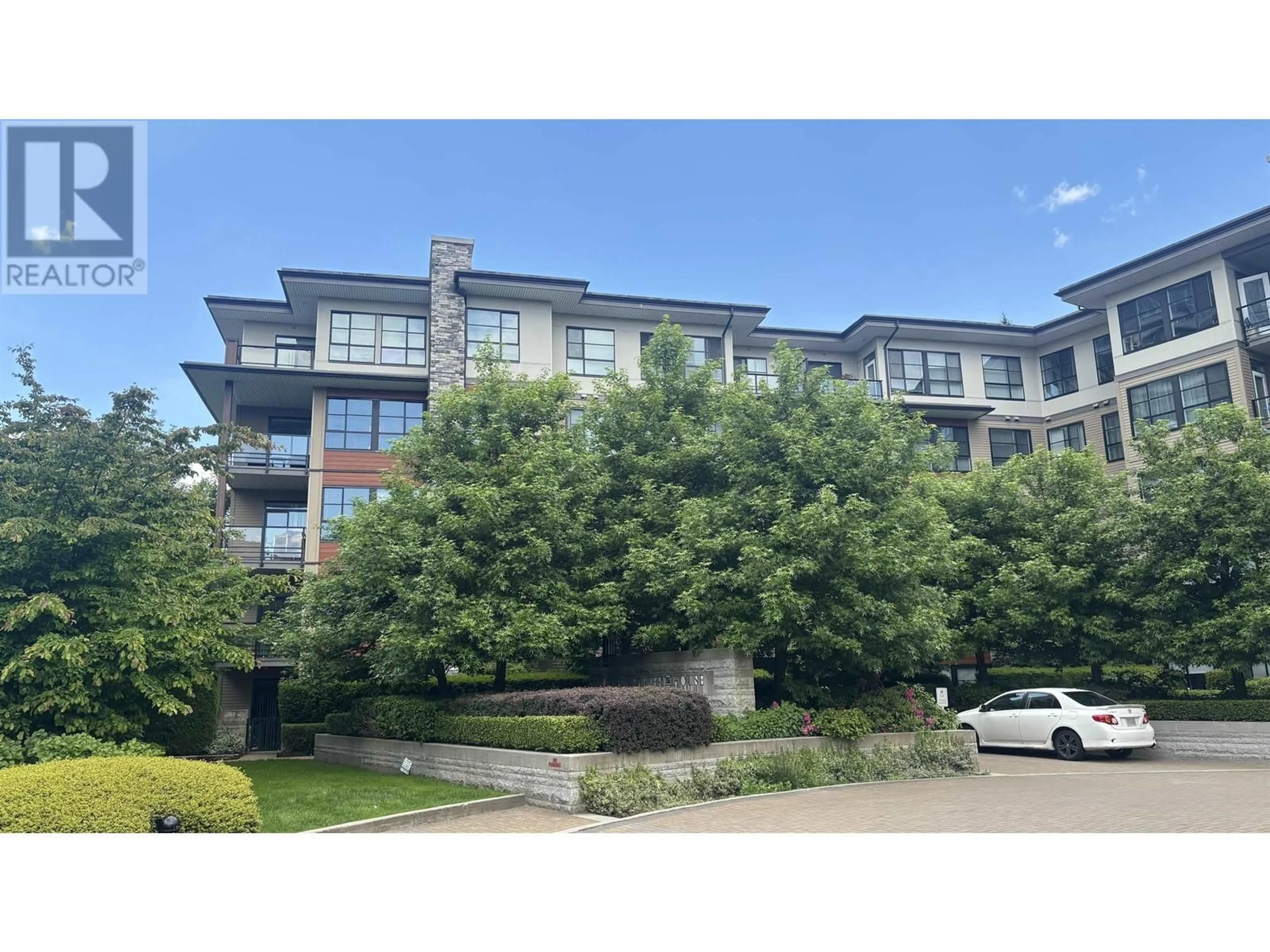 A pic from outside/outdoor area/front of a property/back of a property/a pic from drone, unknown for 408 - 1151 WINDSOR MEWS, Coquitlam British Columbia V3B0M9