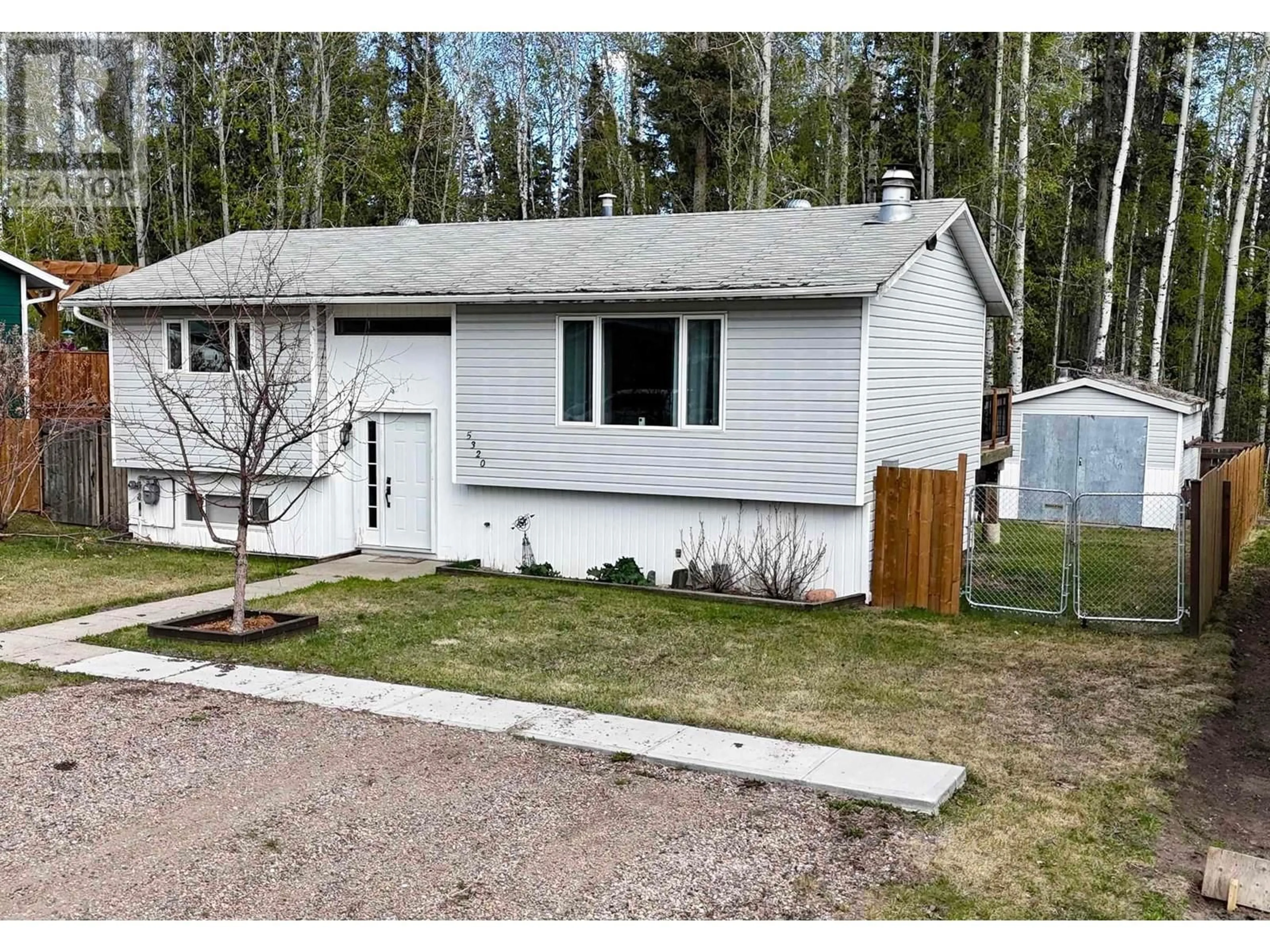 Home with vinyl exterior material, street for 5320 TAMARACK CRESCENT, Fort Nelson British Columbia V0C1R0