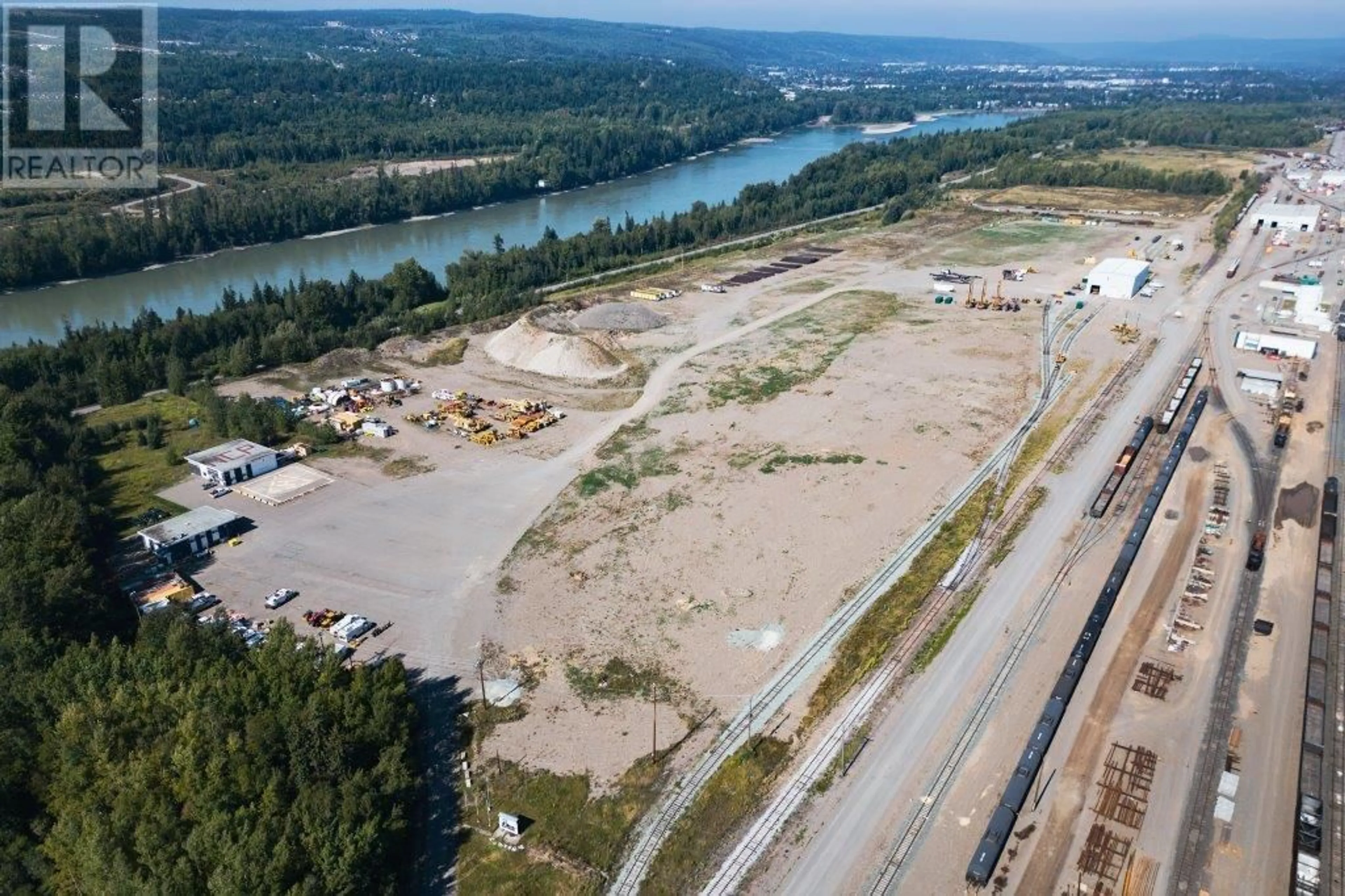A pic from outside/outdoor area/front of a property/back of a property/a pic from drone, water/lake/river/ocean view for 910 SPRUCE PLACE, 100 Mile House British Columbia V0K2E0