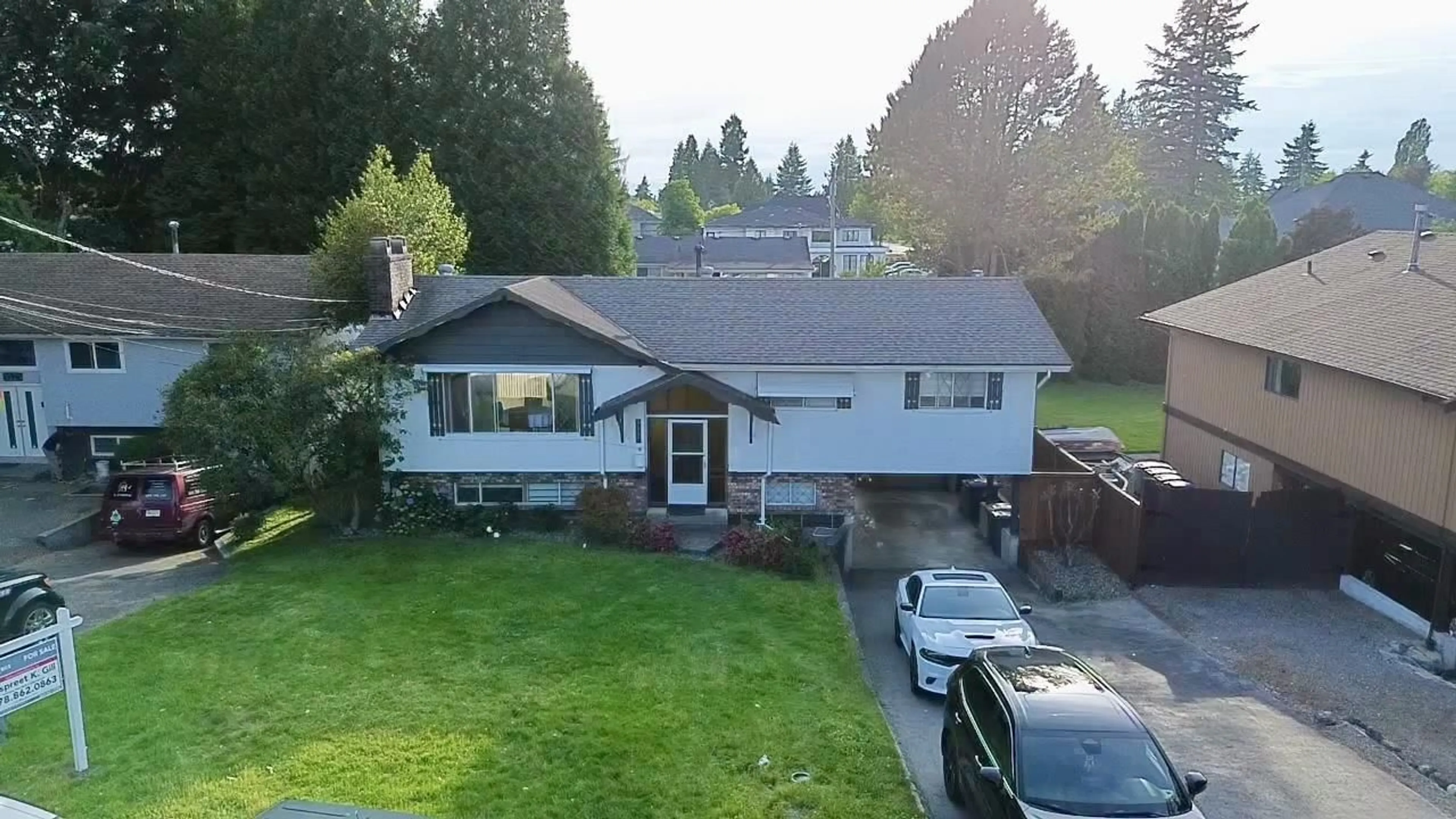 A pic from outside/outdoor area/front of a property/back of a property/a pic from drone, street for 9537 125A STREET, Surrey British Columbia V3V4Z3