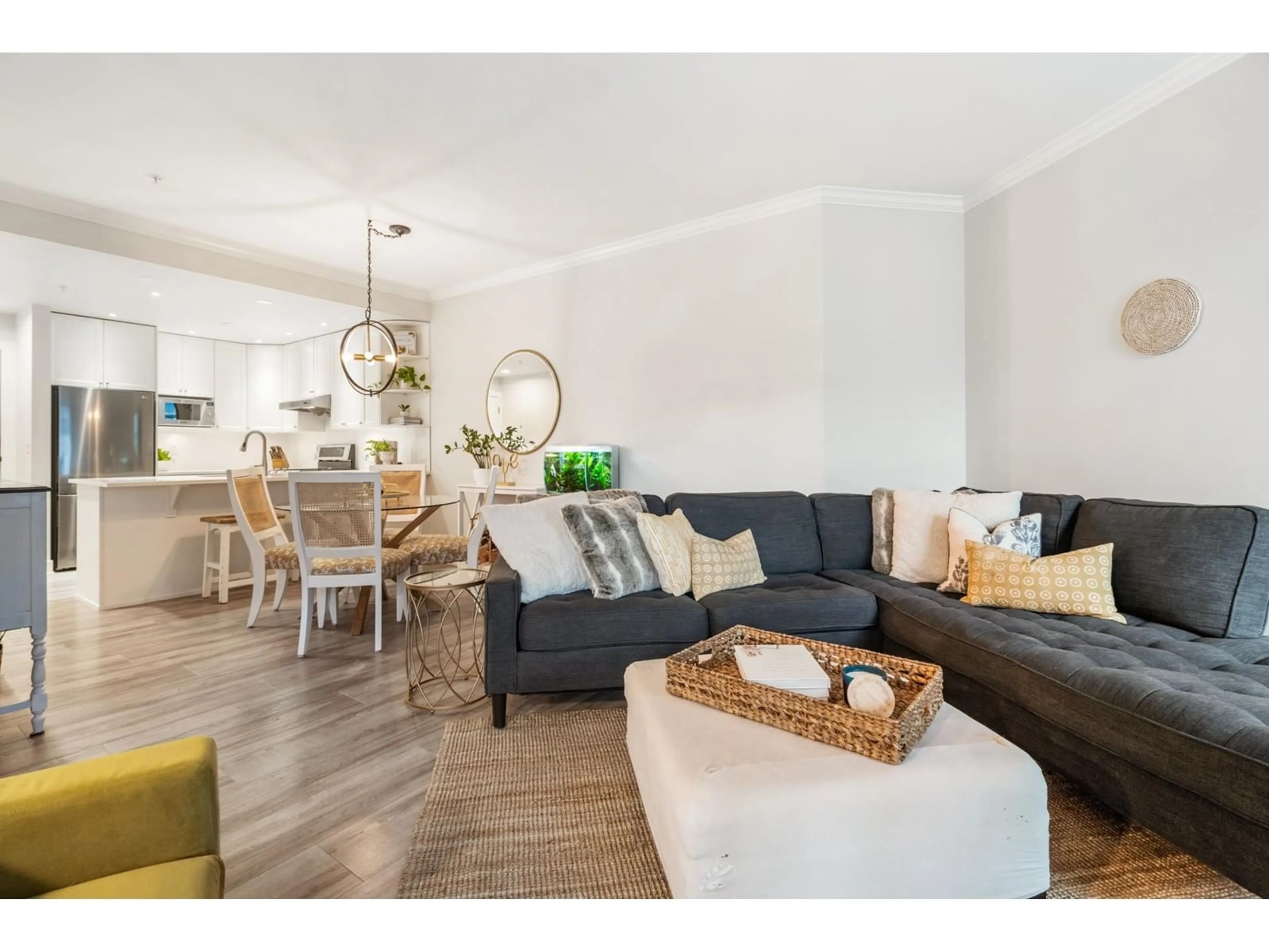 Living room with furniture, wood/laminate floor for 209 - 15368 16A, Surrey British Columbia V4A1S9