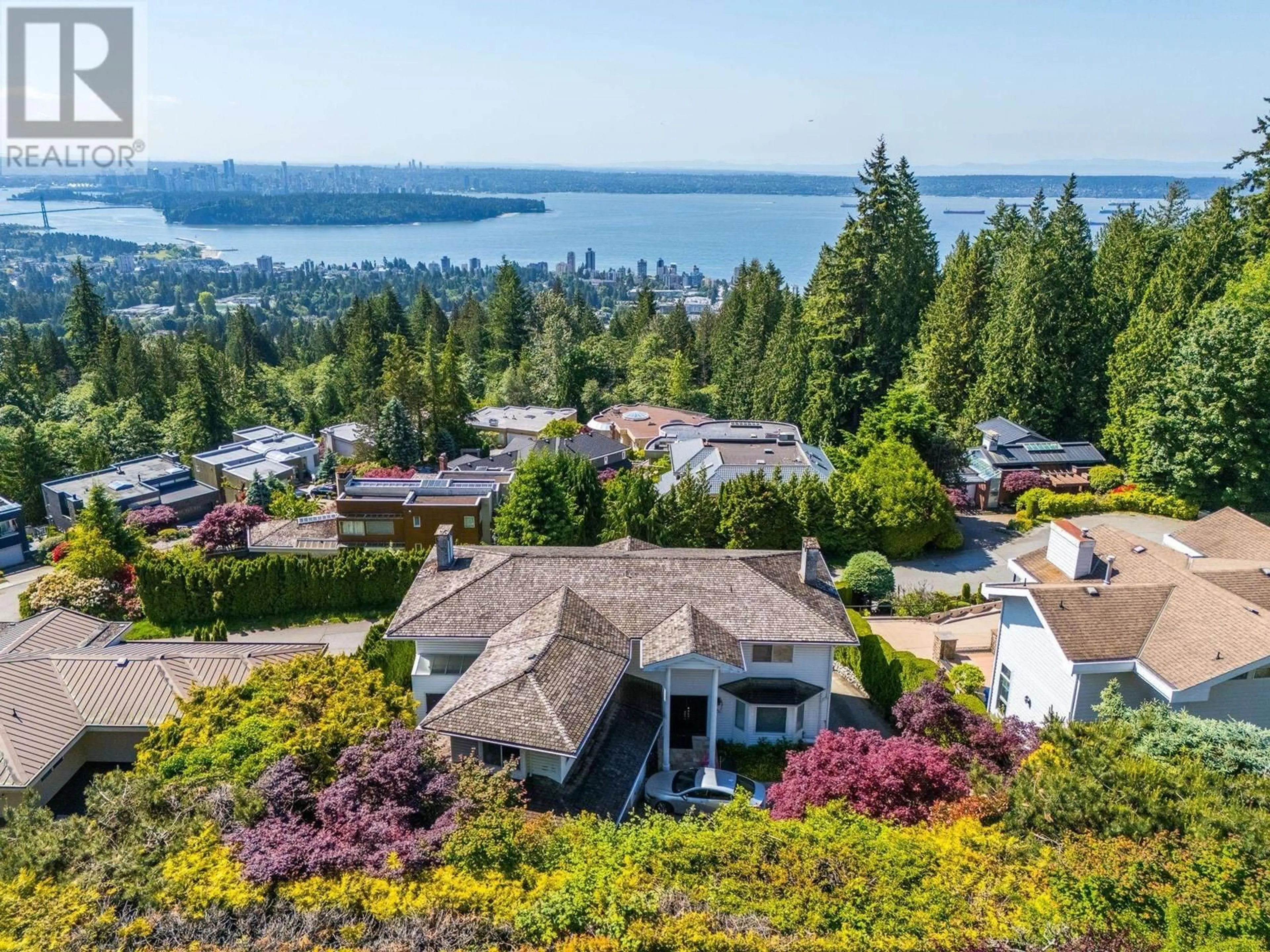 A pic from outside/outdoor area/front of a property/back of a property/a pic from drone, water/lake/river/ocean view for 2585 WESTHILL WAY, West Vancouver British Columbia V7S3E4