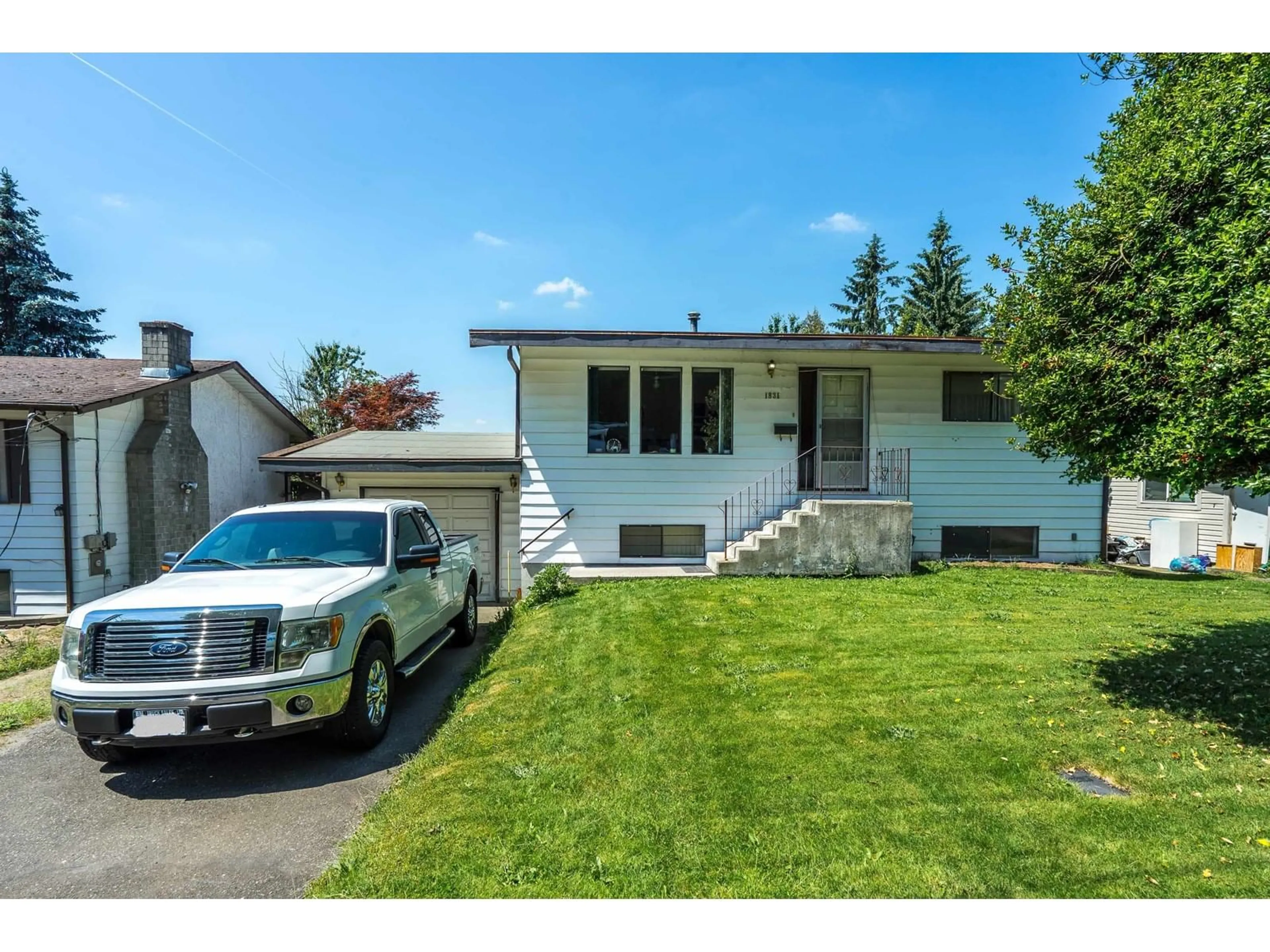 Home with vinyl exterior material, street for 1831 MCKENZIE, Abbotsford British Columbia V2S3Z2