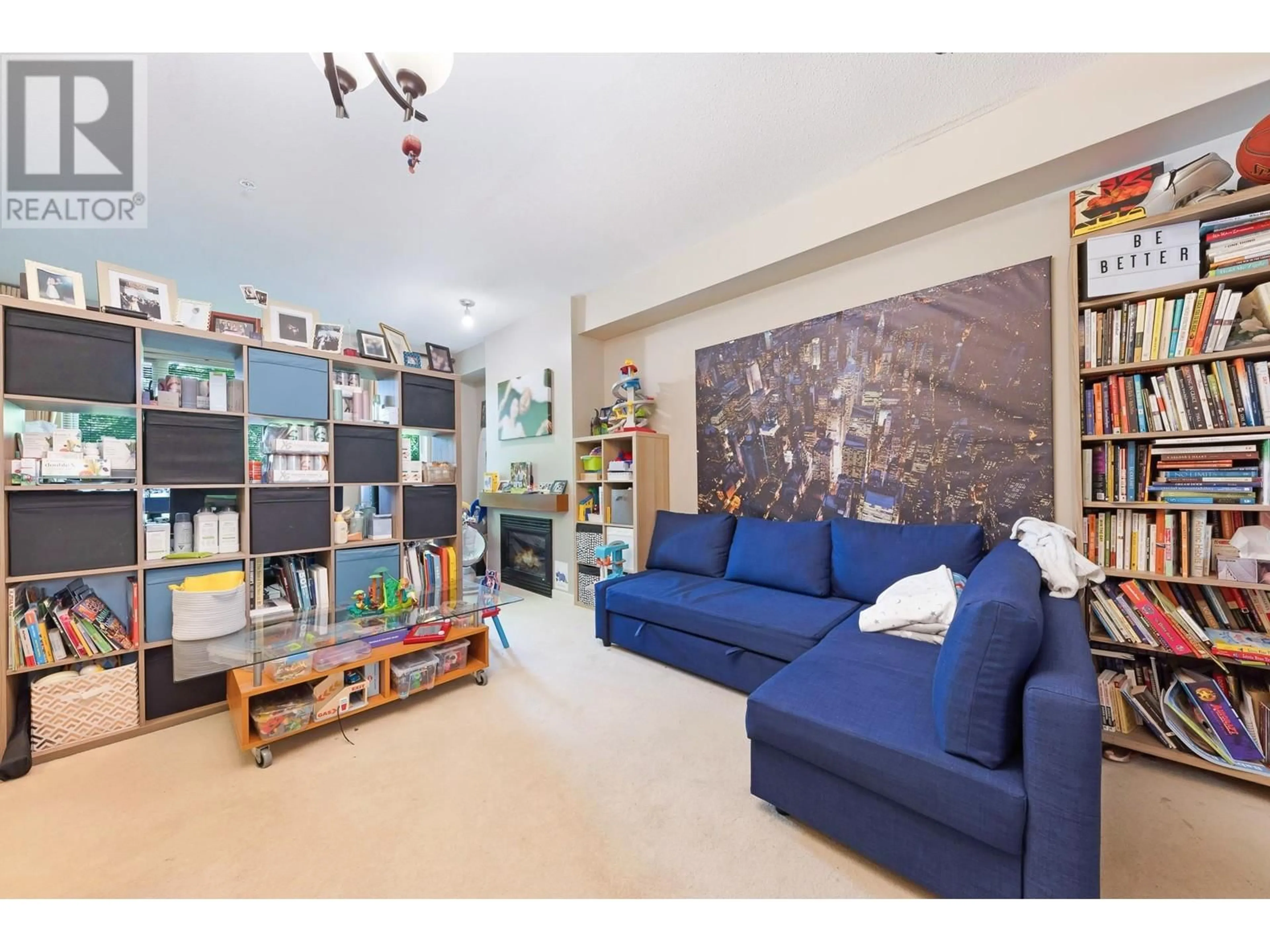 Living room with furniture, unknown for 113 - 9229 UNIVERSITY CRESCENT, Burnaby British Columbia V5A4Z2