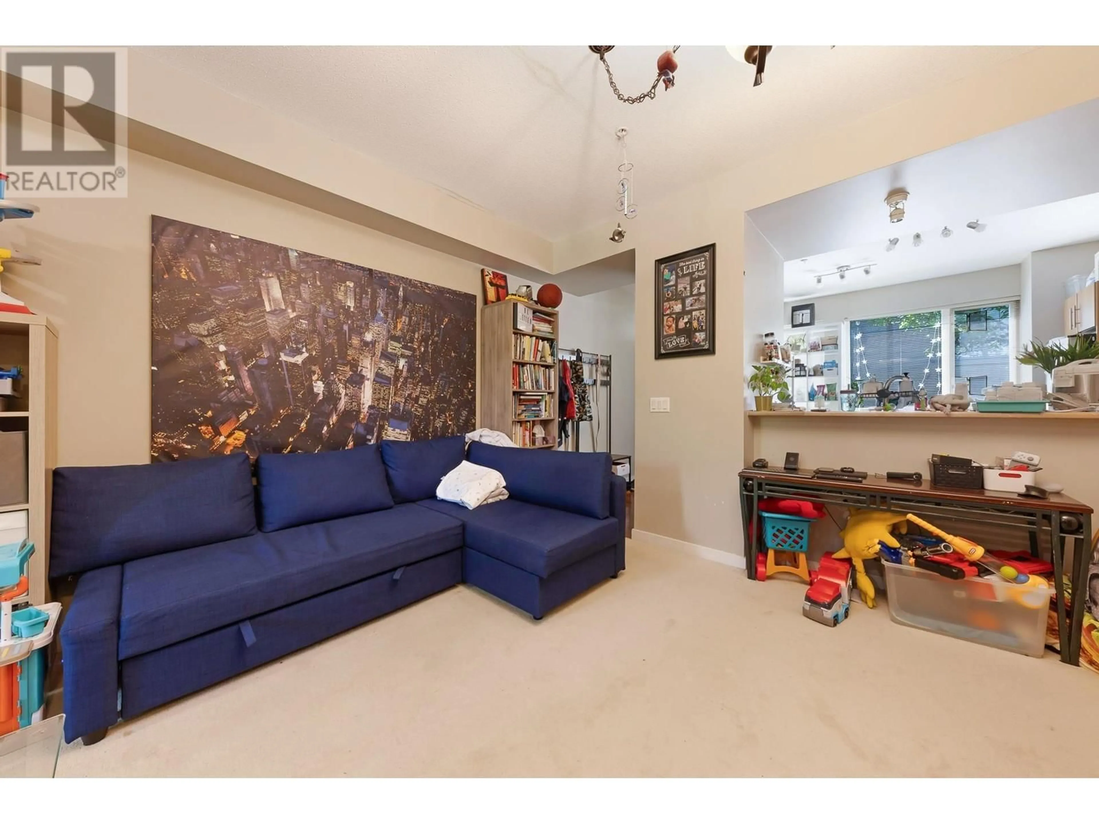 Living room with furniture, unknown for 113 - 9229 UNIVERSITY CRESCENT, Burnaby British Columbia V5A4Z2