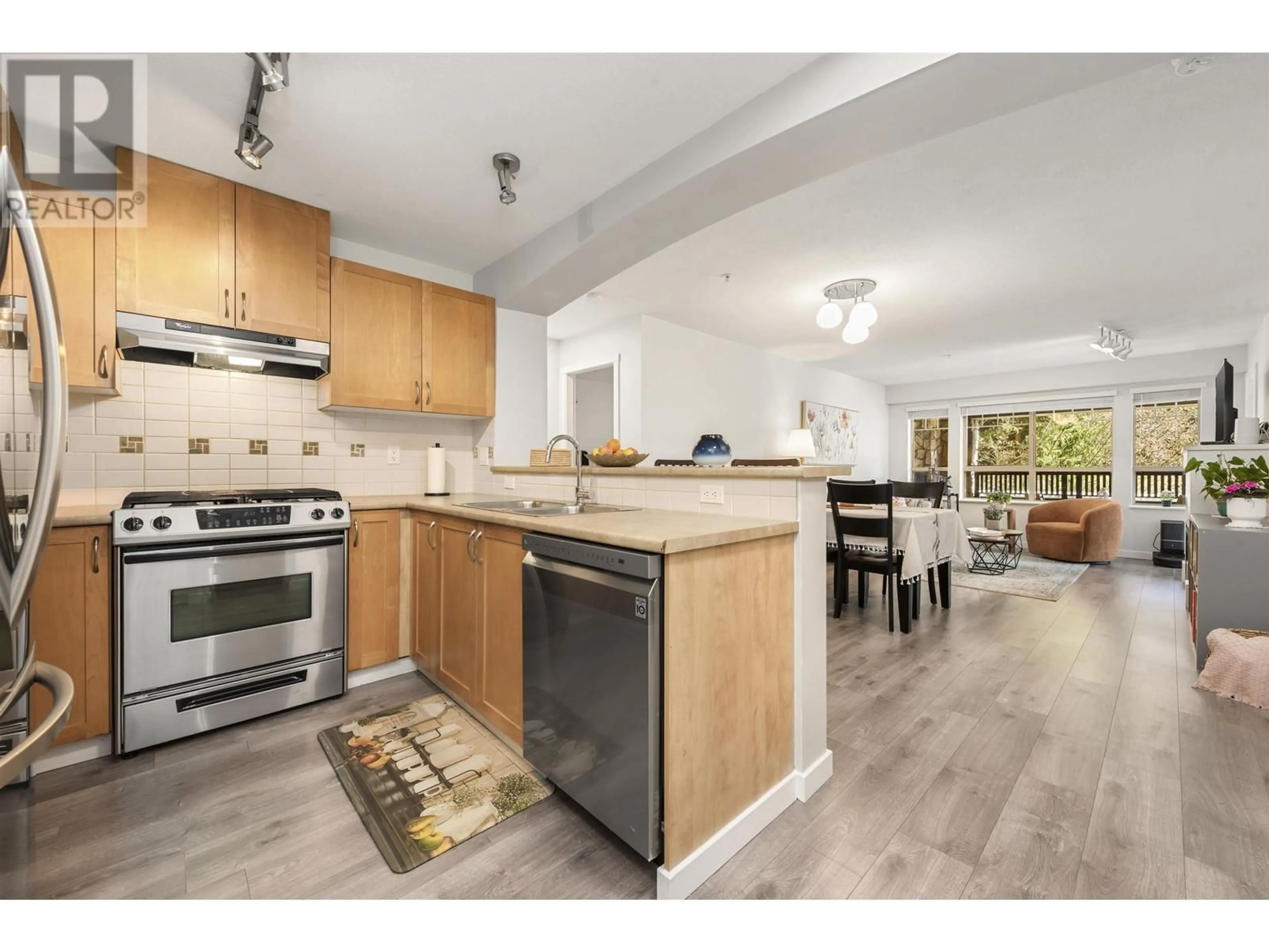 Open concept kitchen, wood/laminate floor for 212 - 2959 SILVER SPRINGS BOULEVARD, Coquitlam British Columbia V3E3S5