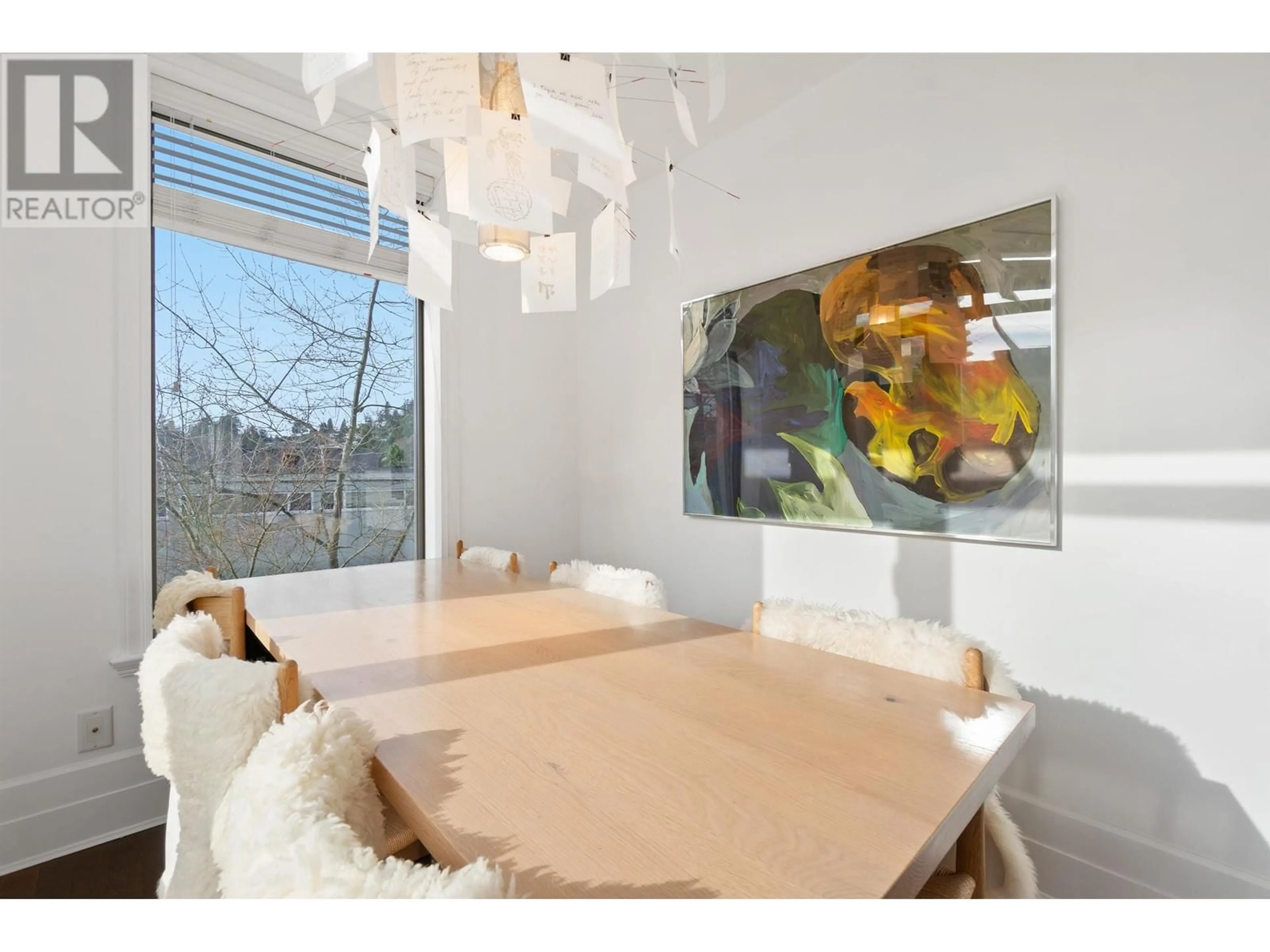 Dining room, wood/laminate floor for 201 - 533 WATERS EDGE CRESCENT, West Vancouver British Columbia V7T0A2