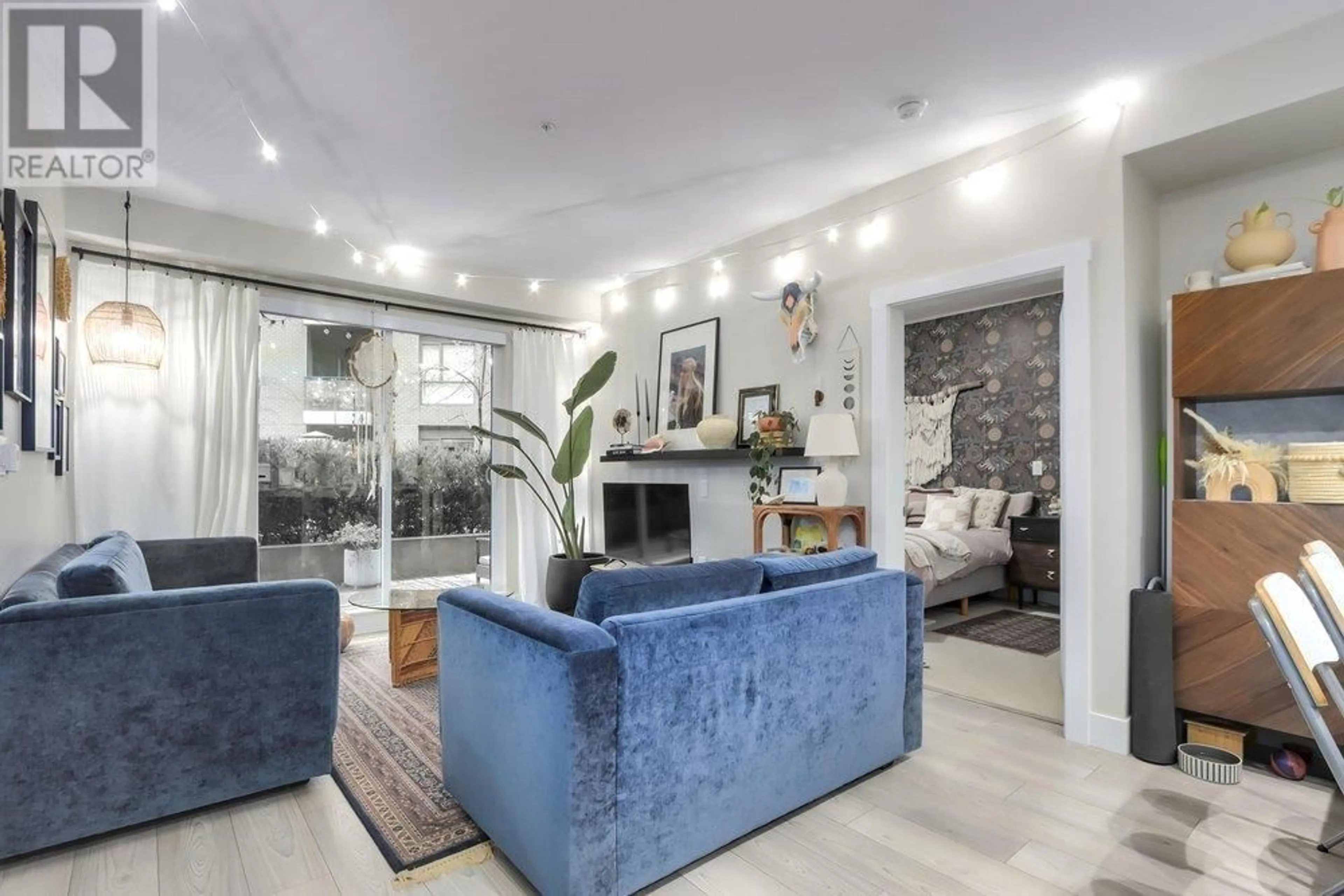 Living room with furniture, unknown for 202 - 3588 SAWMILL CRESCENT, Vancouver British Columbia V5S0H5
