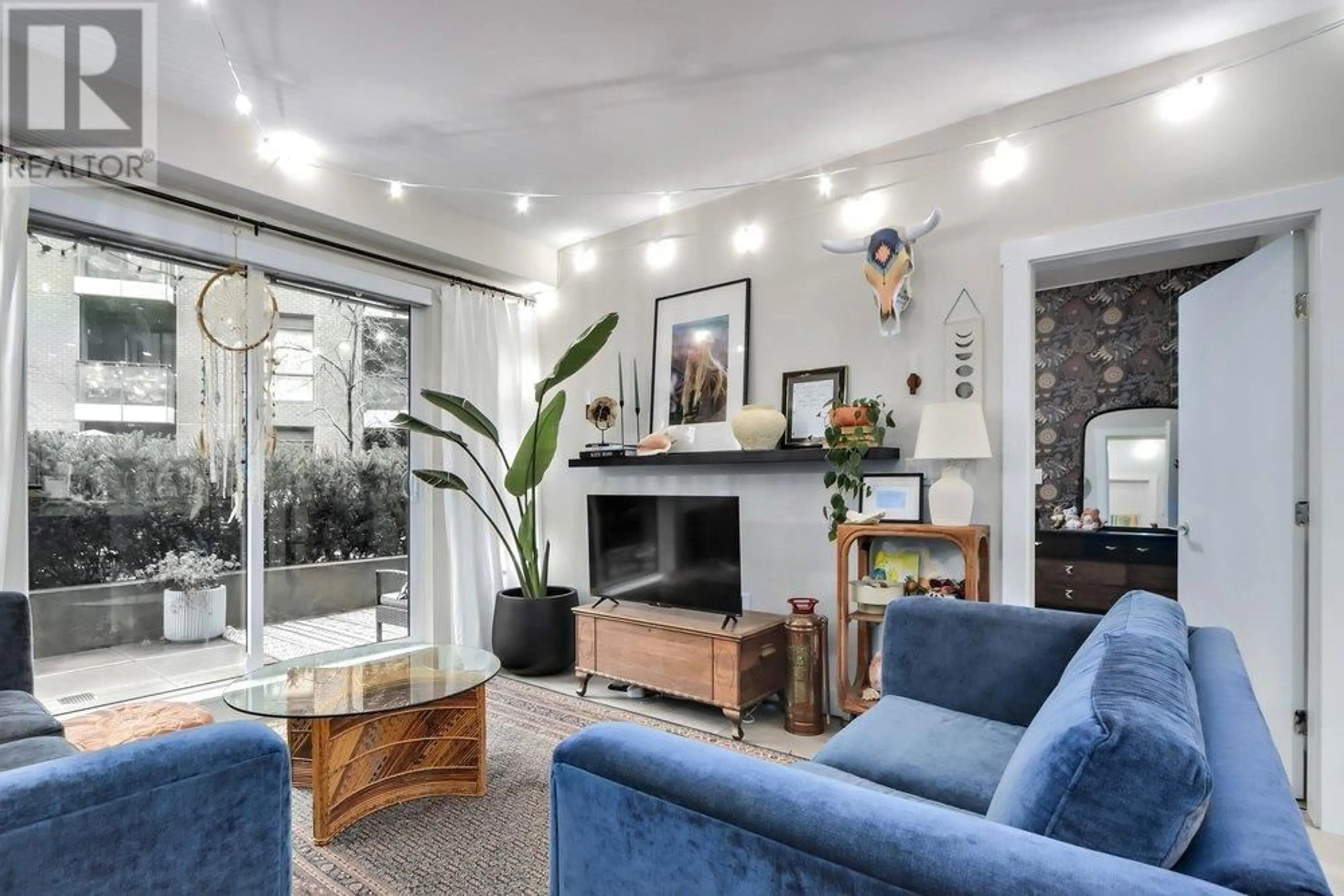 Living room with furniture, unknown for 202 - 3588 SAWMILL CRESCENT, Vancouver British Columbia V5S0H5