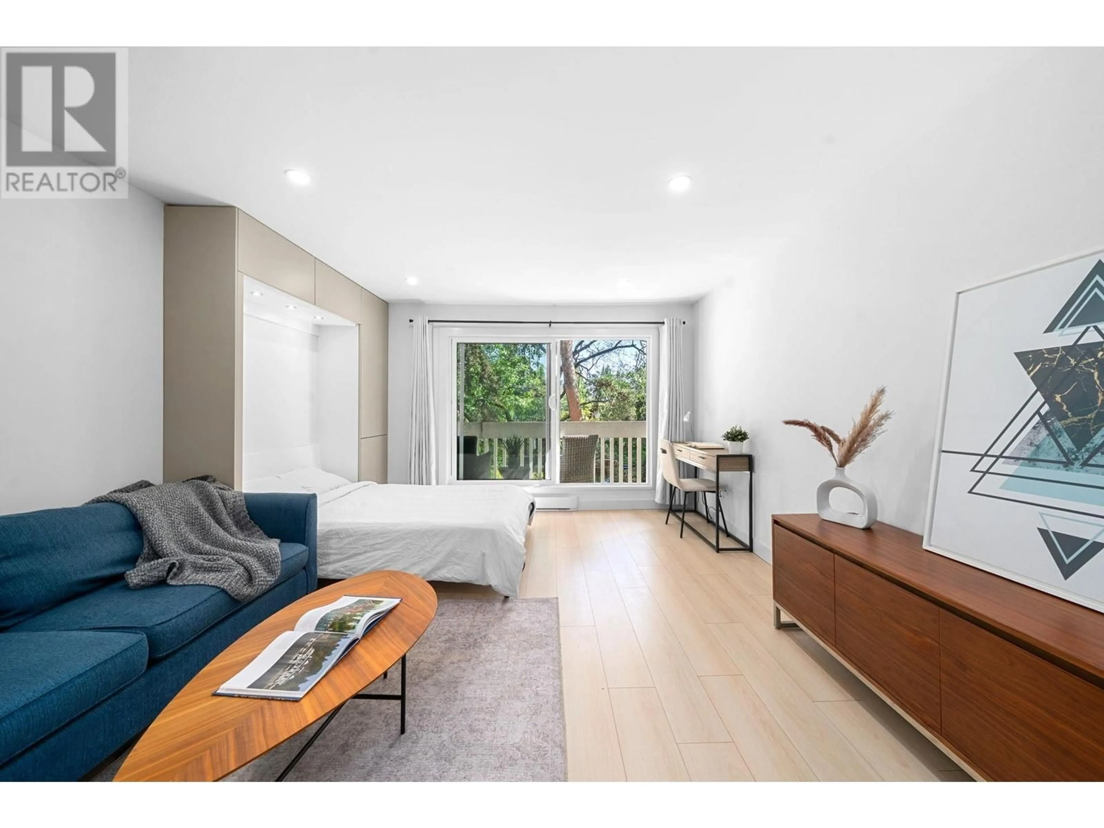 Living room with furniture, wood/laminate floor for 203 - 1545 2ND AVENUE, Vancouver British Columbia V5N1C8