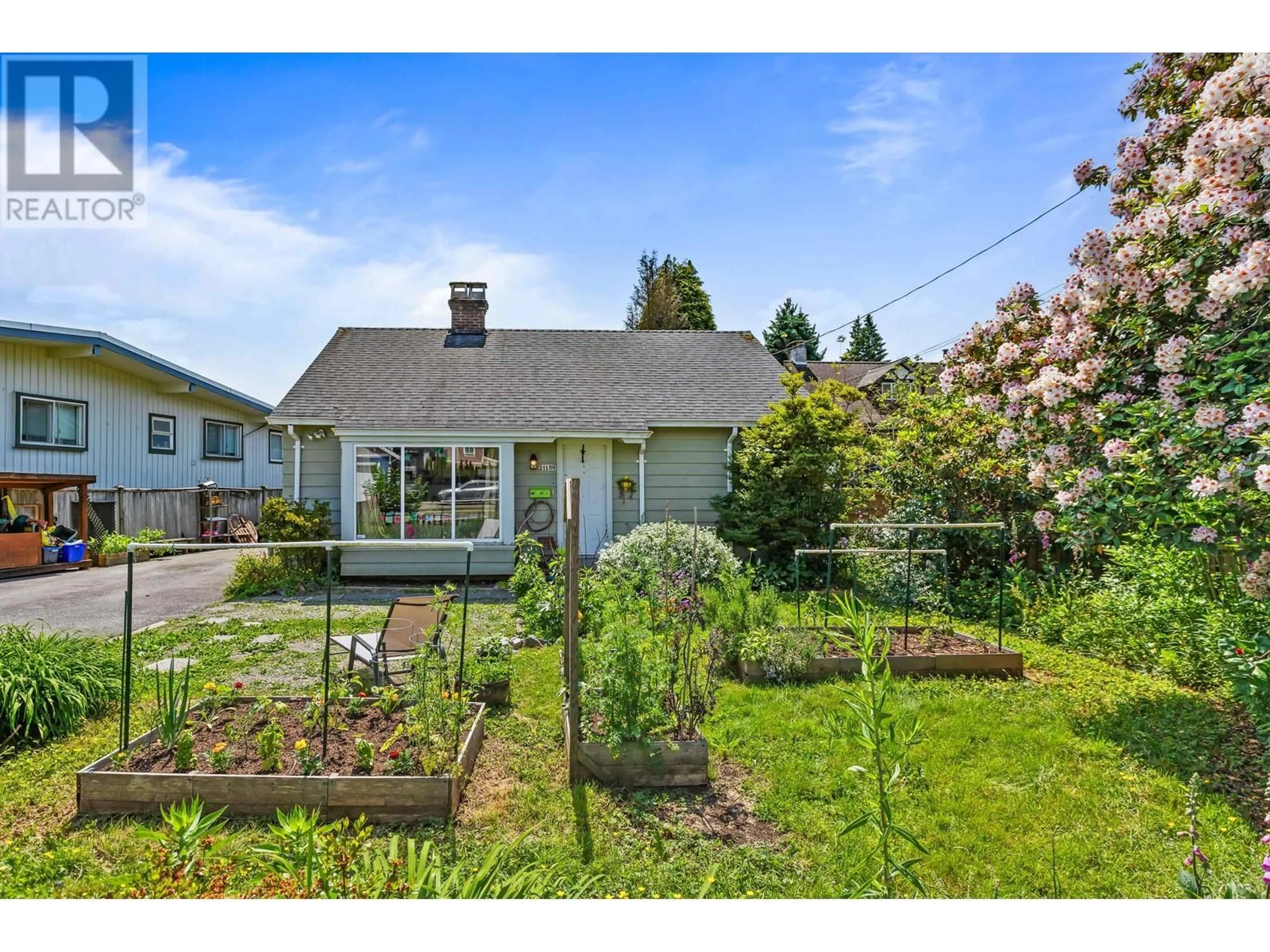 A pic from outside/outdoor area/front of a property/back of a property/a pic from drone, street for 21158 RIVER ROAD, Maple Ridge British Columbia V2X2A3