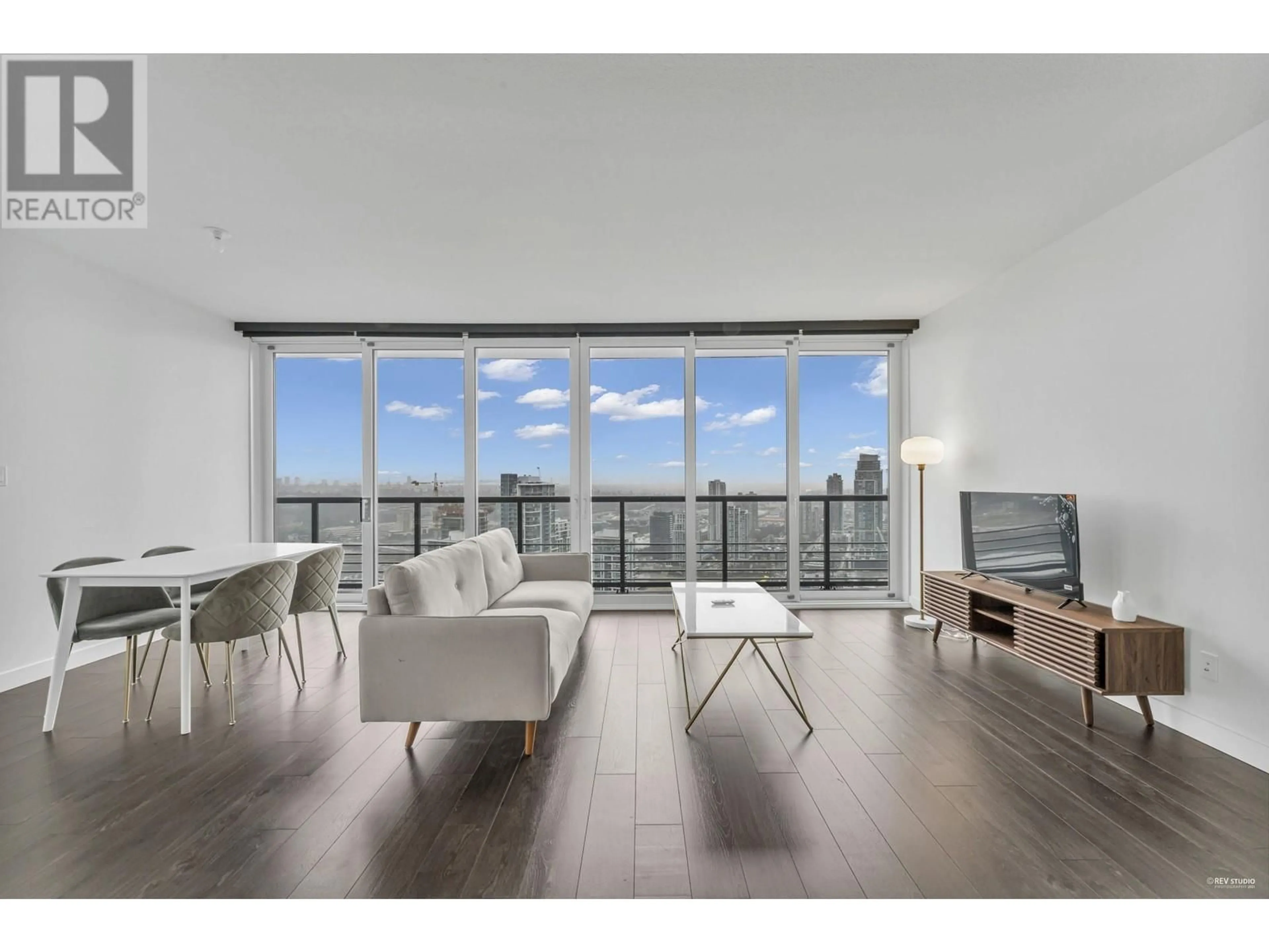 Living room with furniture, wood/laminate floor for 3402 - 4730 LOUGHEED HIGHWAY, Burnaby British Columbia V5C0M9