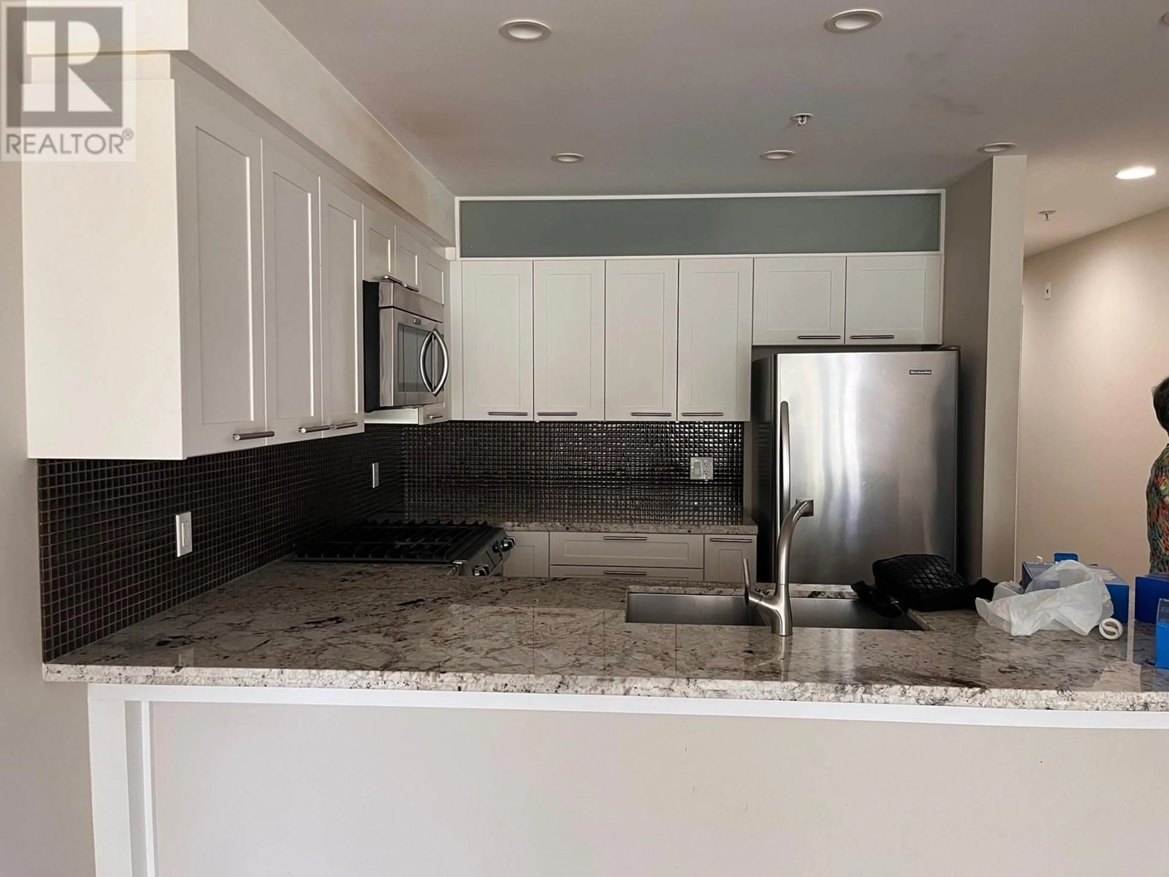Open concept kitchen, ceramic/tile floor for 204 - 5665 TEREDO STREET, Sechelt British Columbia V7Z0J2