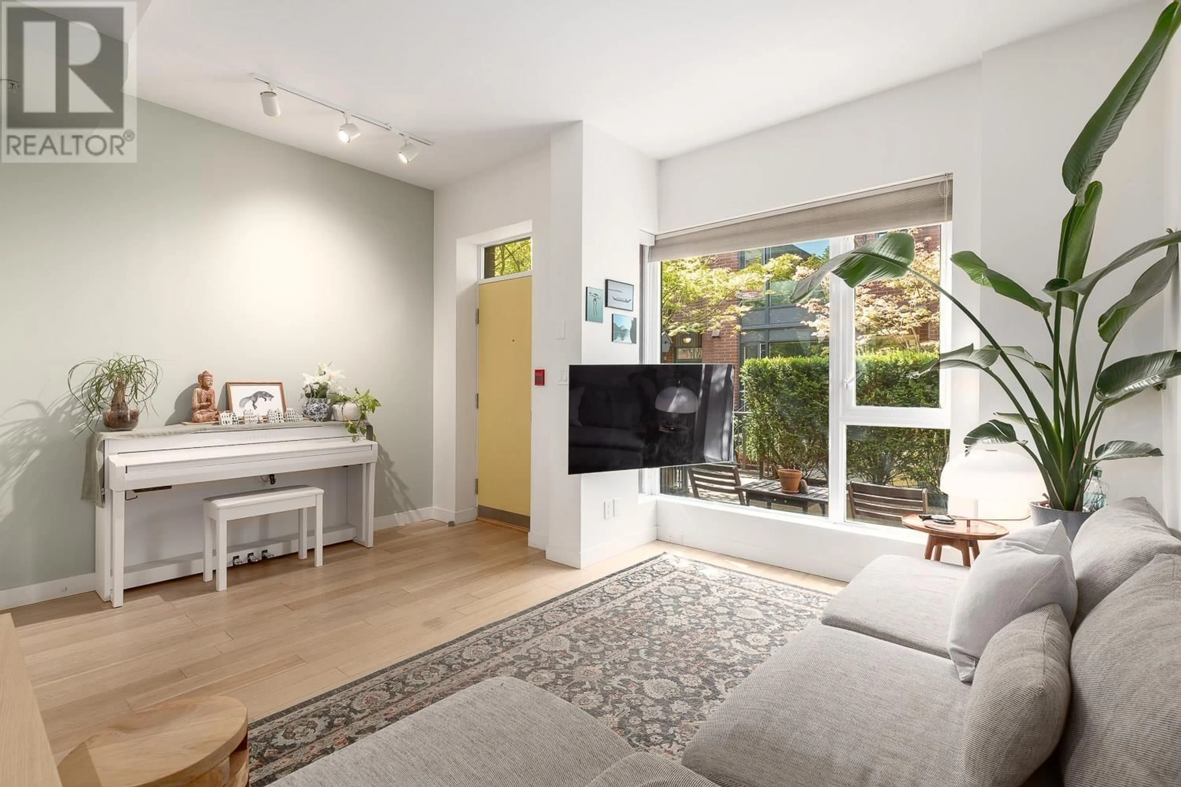 Living room with furniture, unknown for 219 - 1961 COLLINGWOOD STREET, Vancouver British Columbia V6R3K6