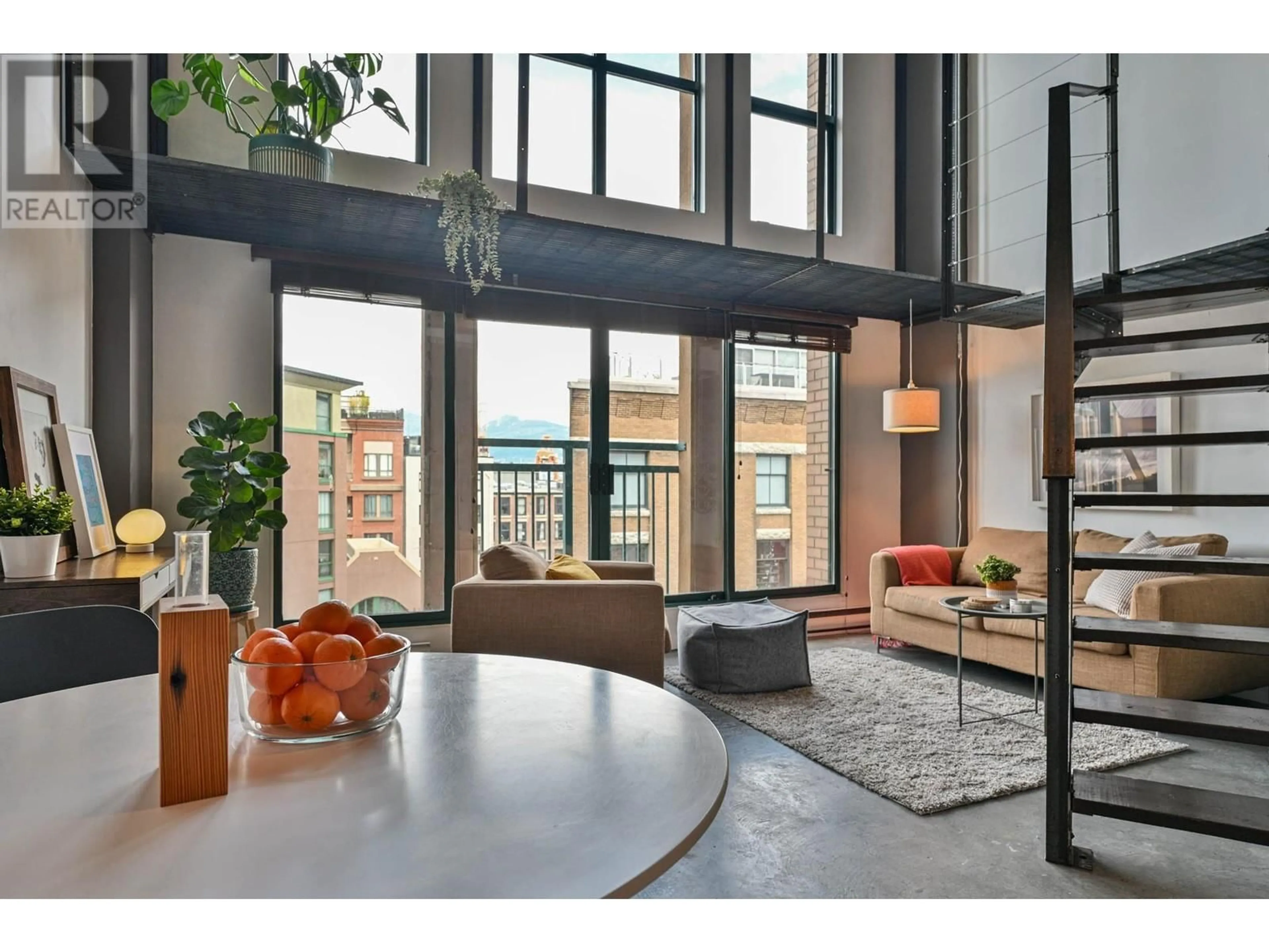 Living room with furniture, cement floor for 509 - 22 CORDOVA STREET, Vancouver British Columbia V6A4G8