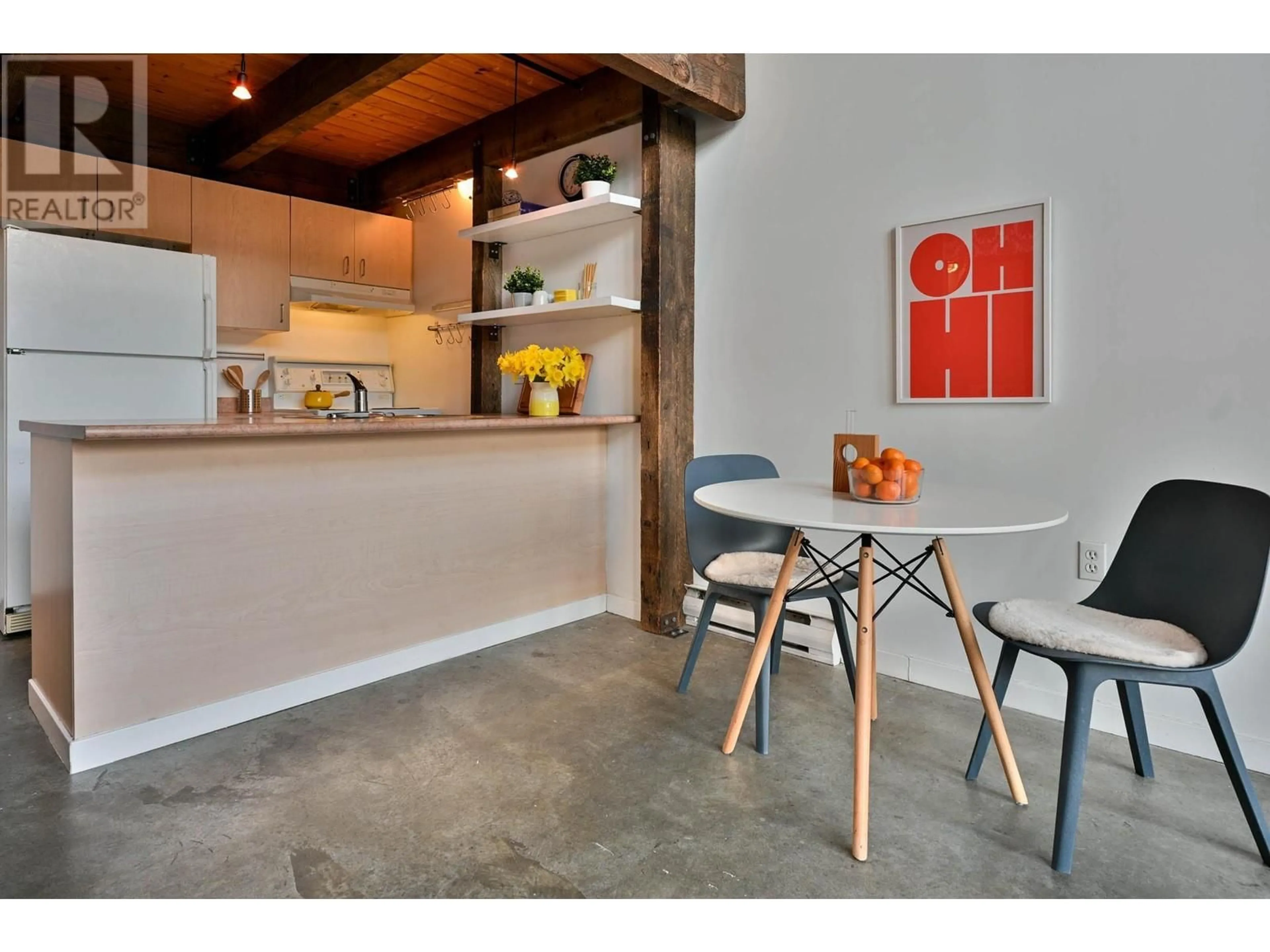 Open concept kitchen, cement floor for 509 - 22 CORDOVA STREET, Vancouver British Columbia V6A4G8