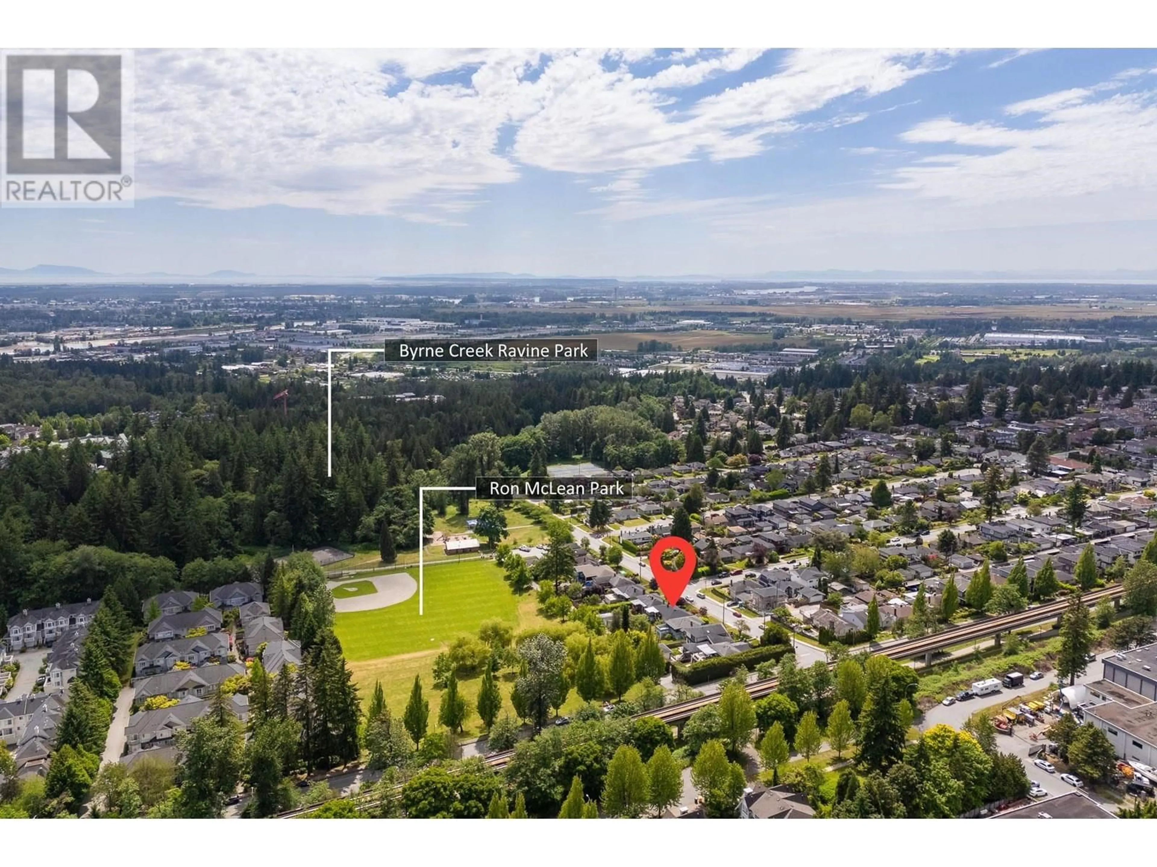 A pic from outside/outdoor area/front of a property/back of a property/a pic from drone, mountain view for 7658 HEDLEY AVENUE, Burnaby British Columbia V5E2R3