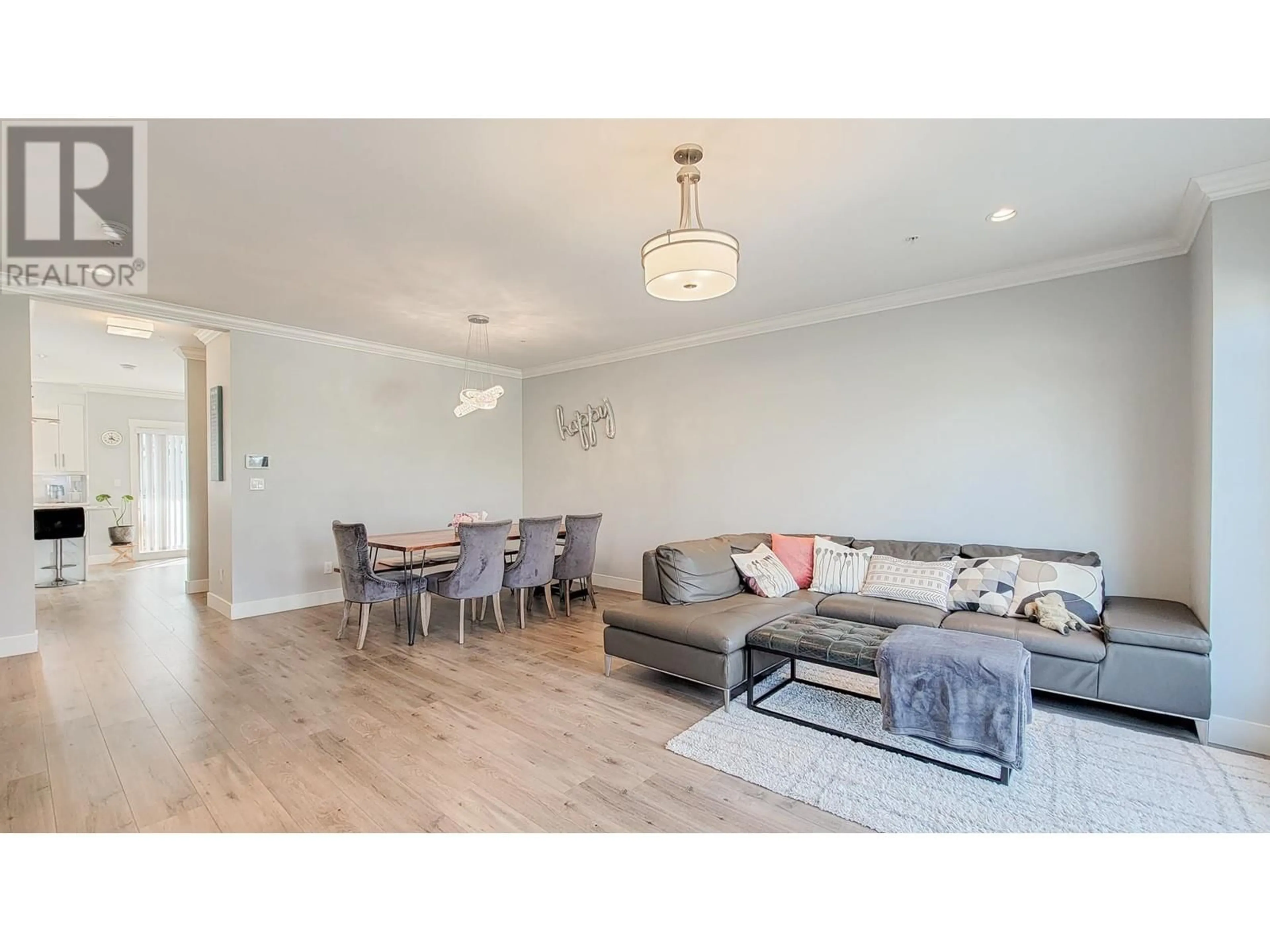 Living room with furniture, wood/laminate floor for 3 - 3126 WELLINGTON STREET, Port Coquitlam British Columbia V3B3X4