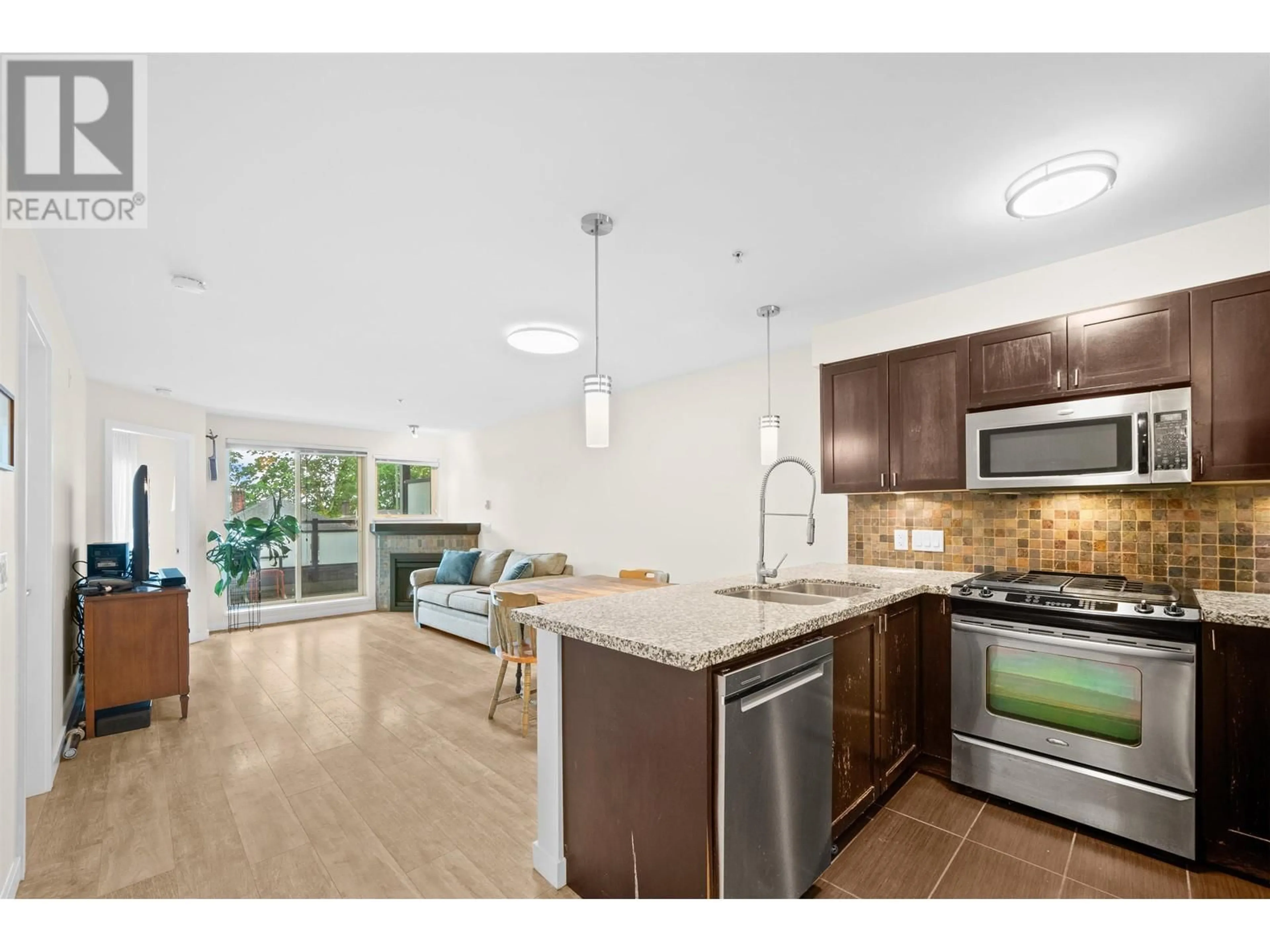 Open concept kitchen, unknown for 202 - 405 SKEENA STREET, Vancouver British Columbia V5K0A3