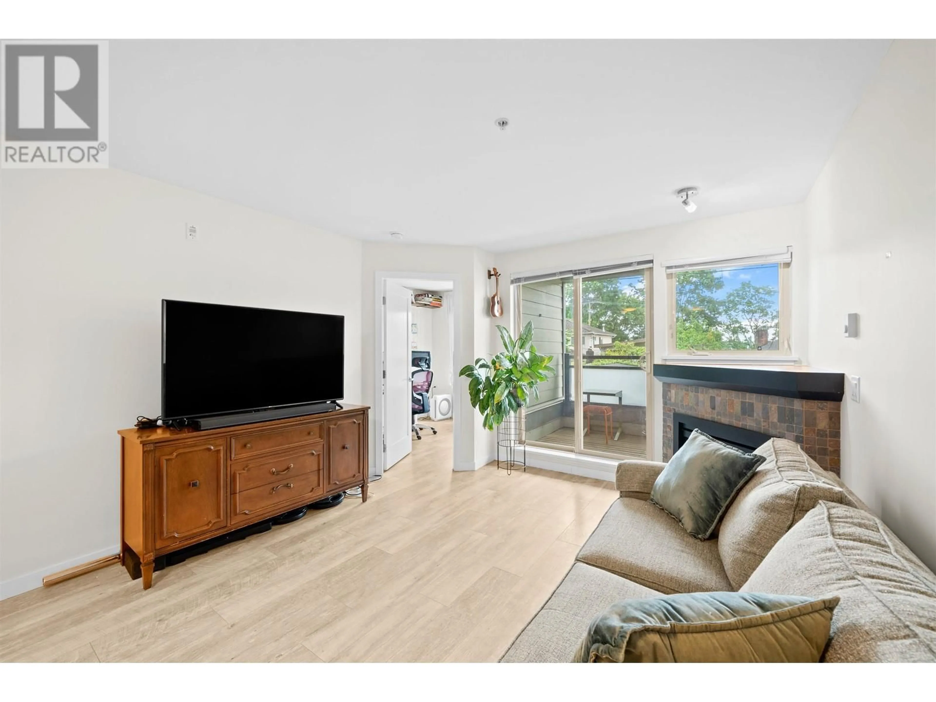 Living room with furniture, unknown for 202 - 405 SKEENA STREET, Vancouver British Columbia V5K0A3