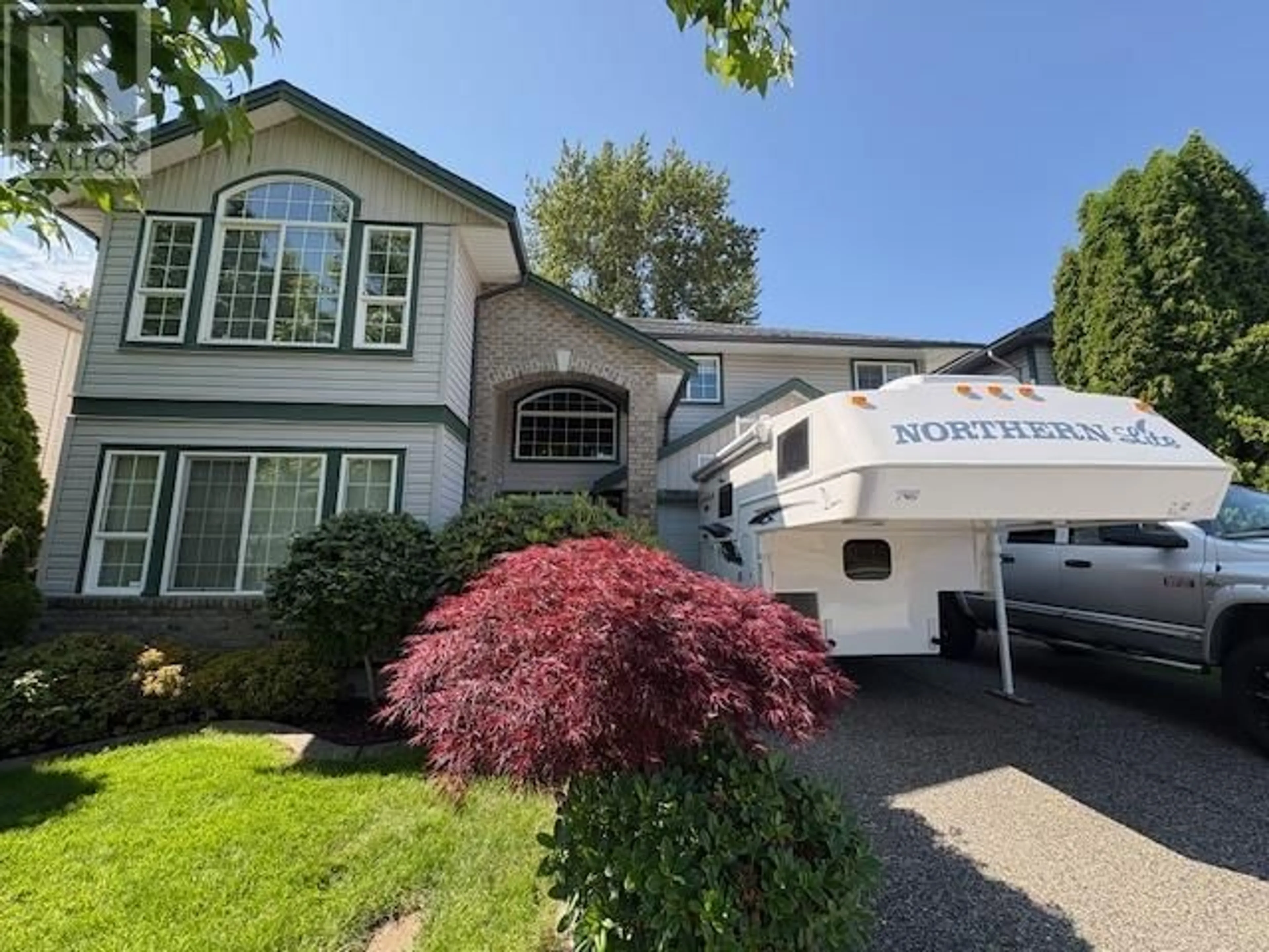 Home with vinyl exterior material, street for 11789 CREEKSIDE STREET, Maple Ridge British Columbia V4R2V4