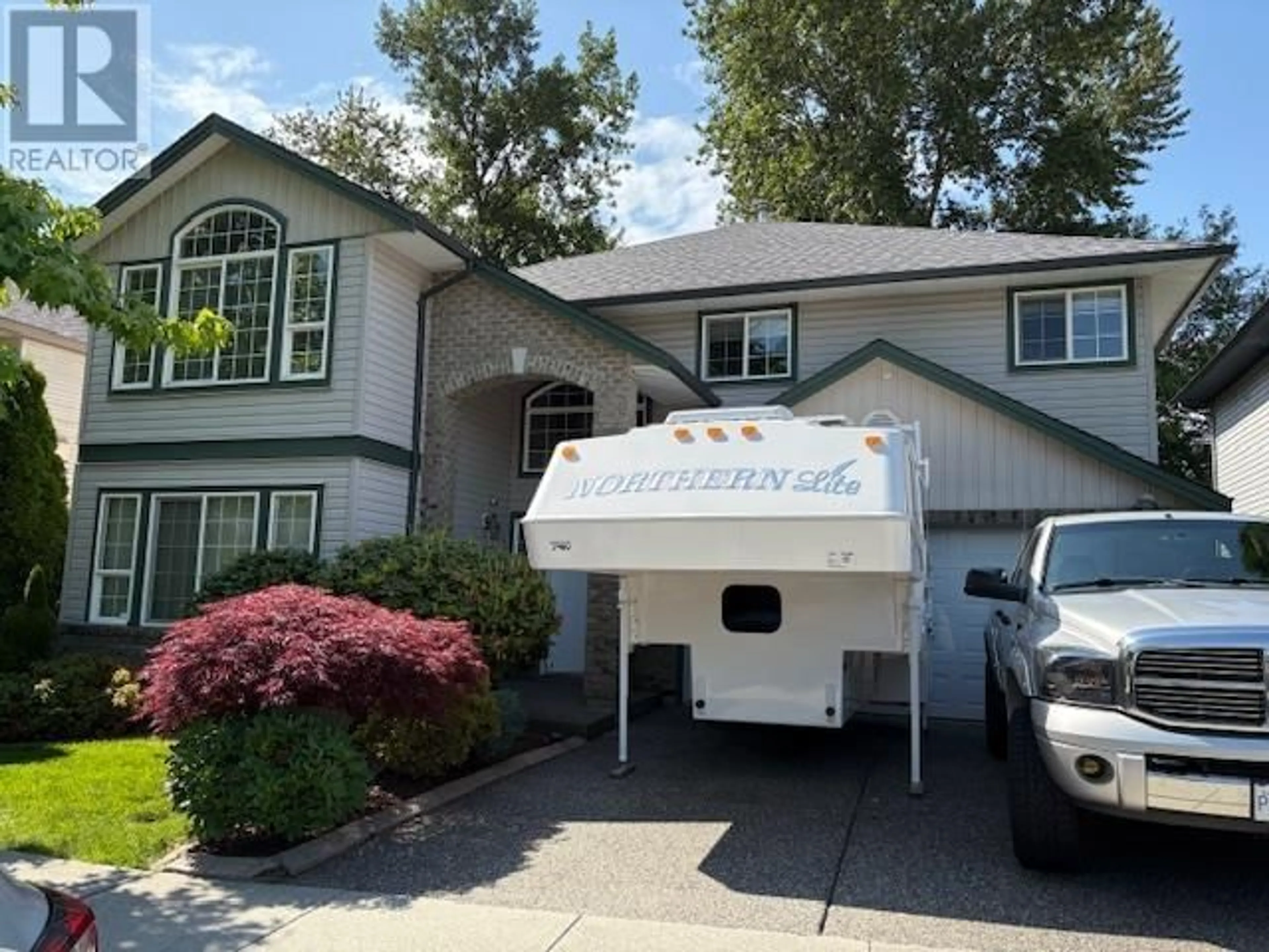 Home with vinyl exterior material, street for 11789 CREEKSIDE STREET, Maple Ridge British Columbia V4R2V4