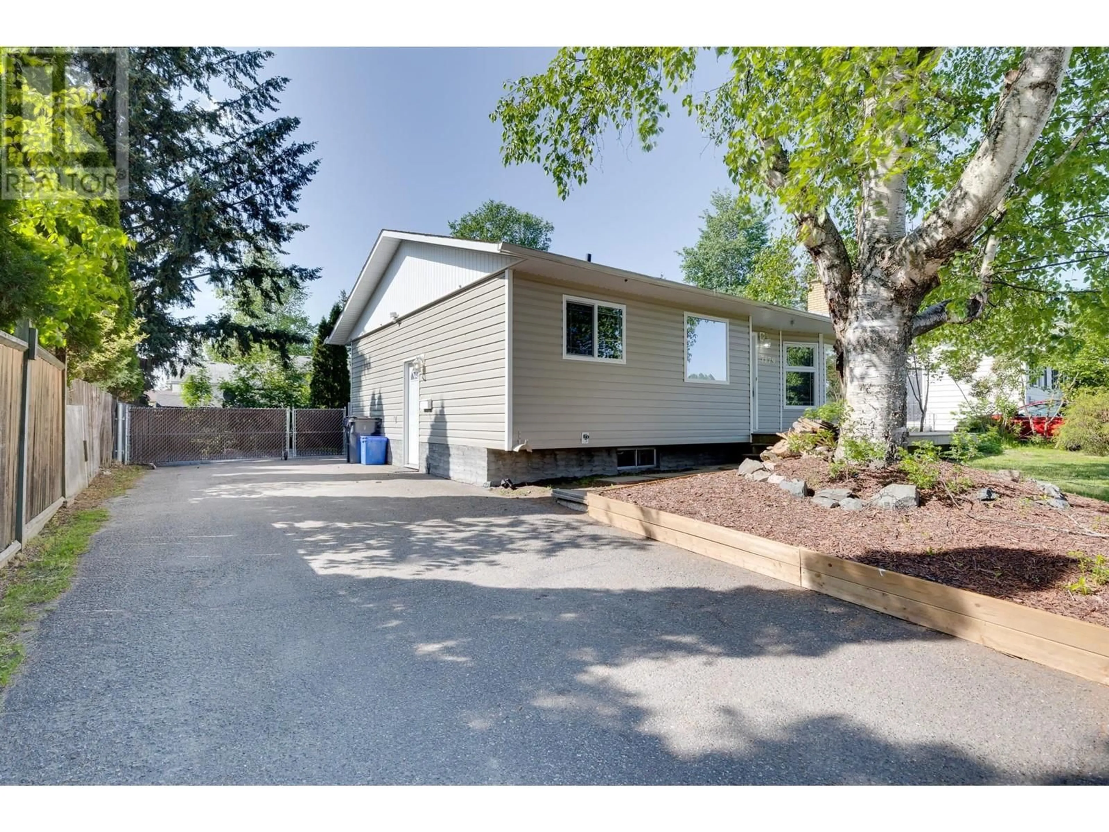 Home with vinyl exterior material, street for 7179 HARVARD CRESCENT, Prince George British Columbia V2N2V6