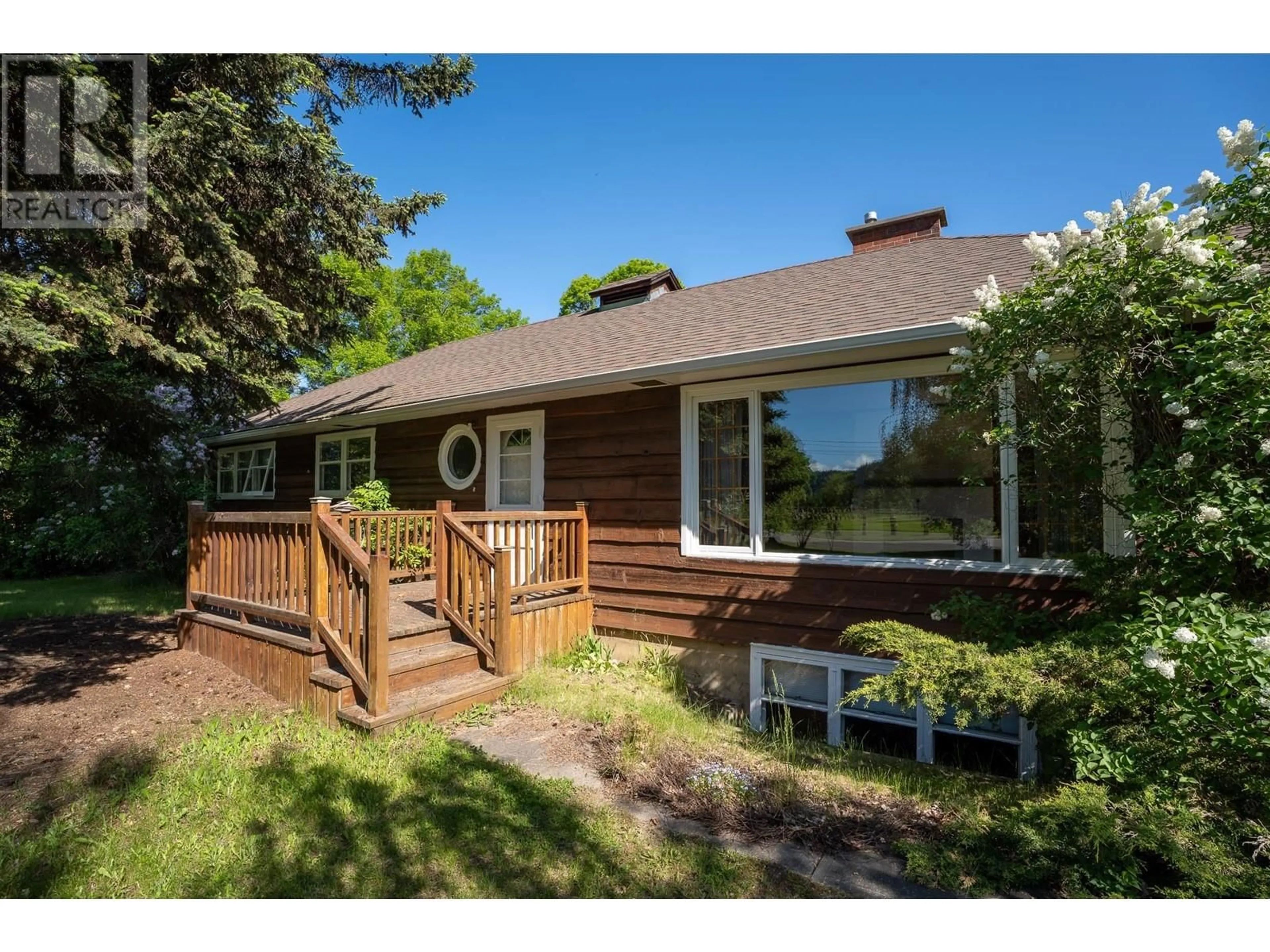 Home with brick exterior material, street for 1585 TAYLOR DRIVE, Prince George British Columbia V2L1A3