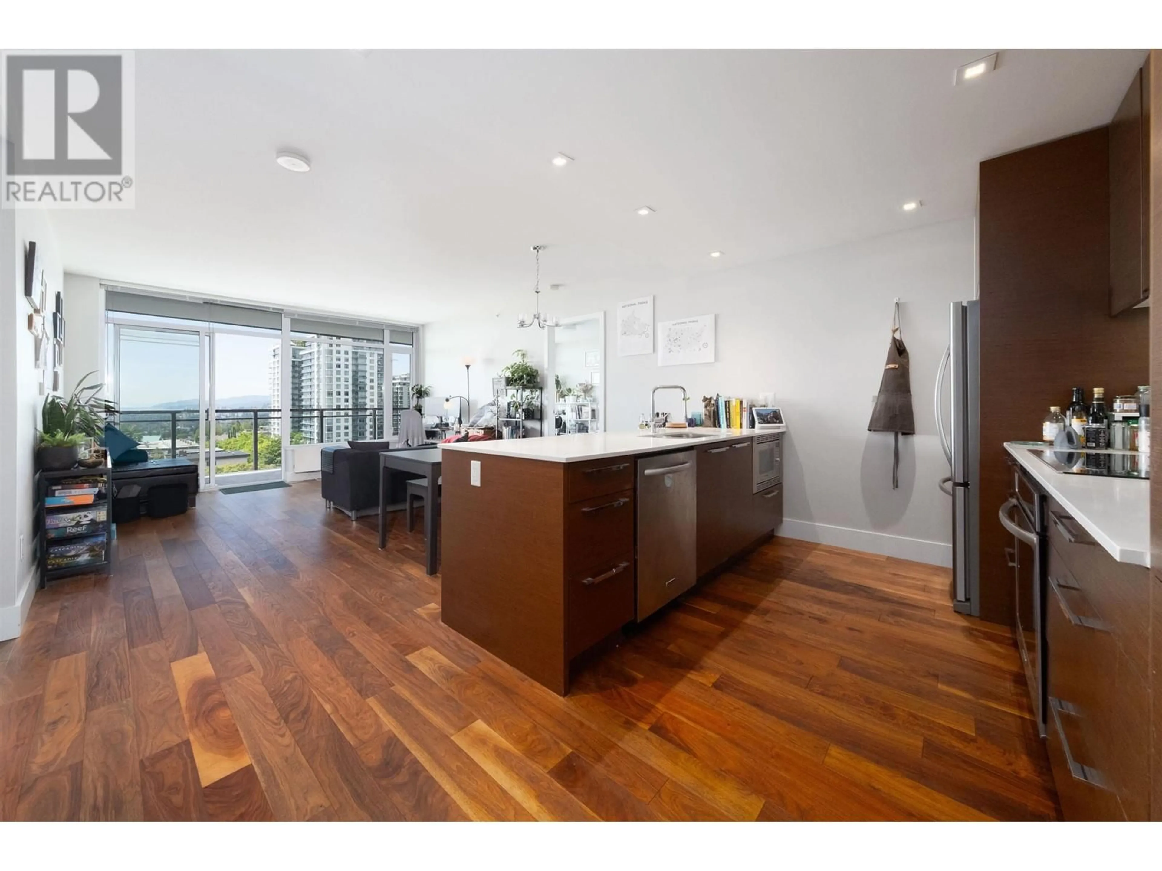 Open concept kitchen, wood/laminate floor for 604 - 111 13TH STREET, North Vancouver British Columbia V7L0C7
