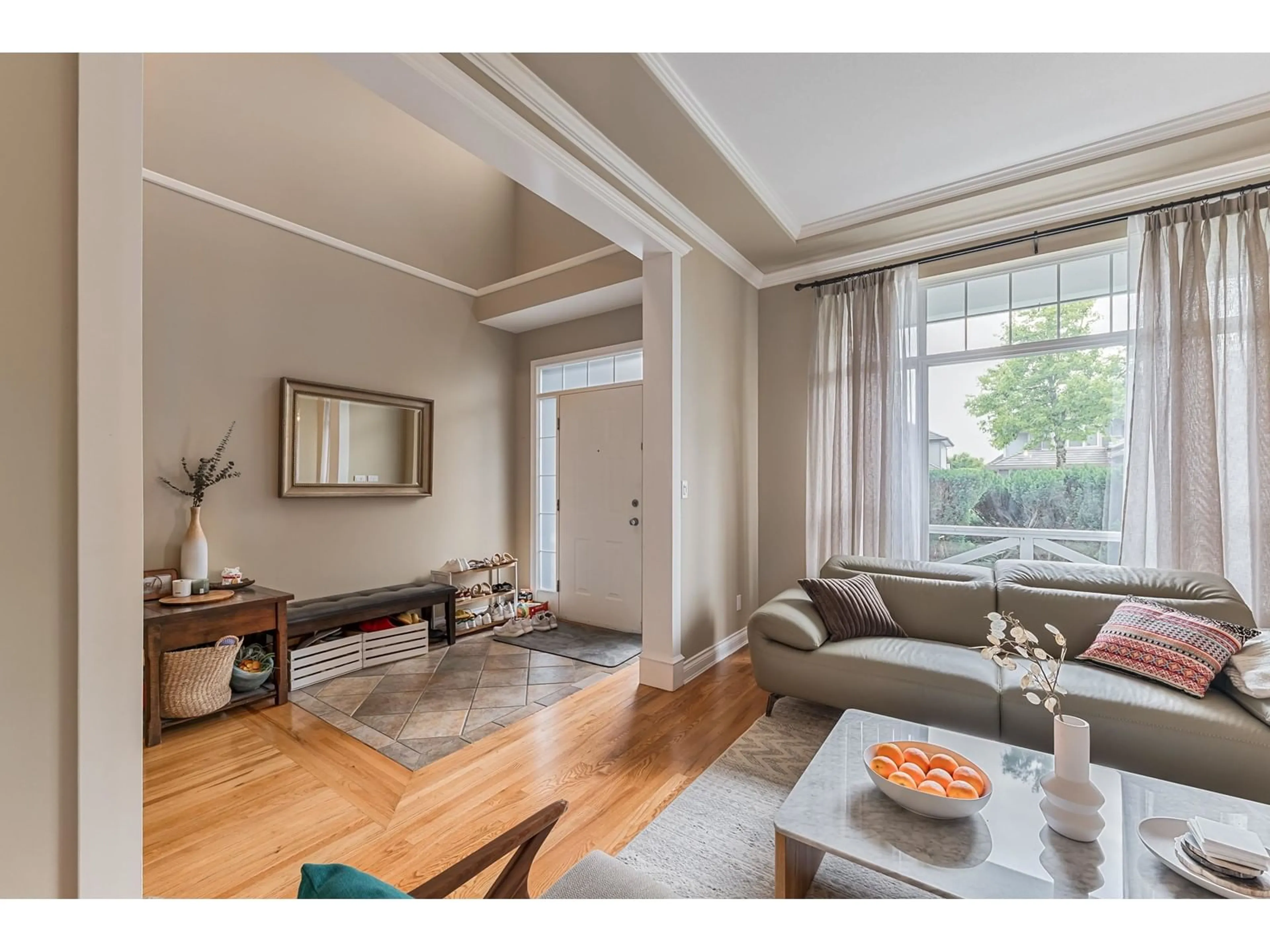 Living room with furniture, wood/laminate floor for 7321 146, Surrey British Columbia V3S8Z7