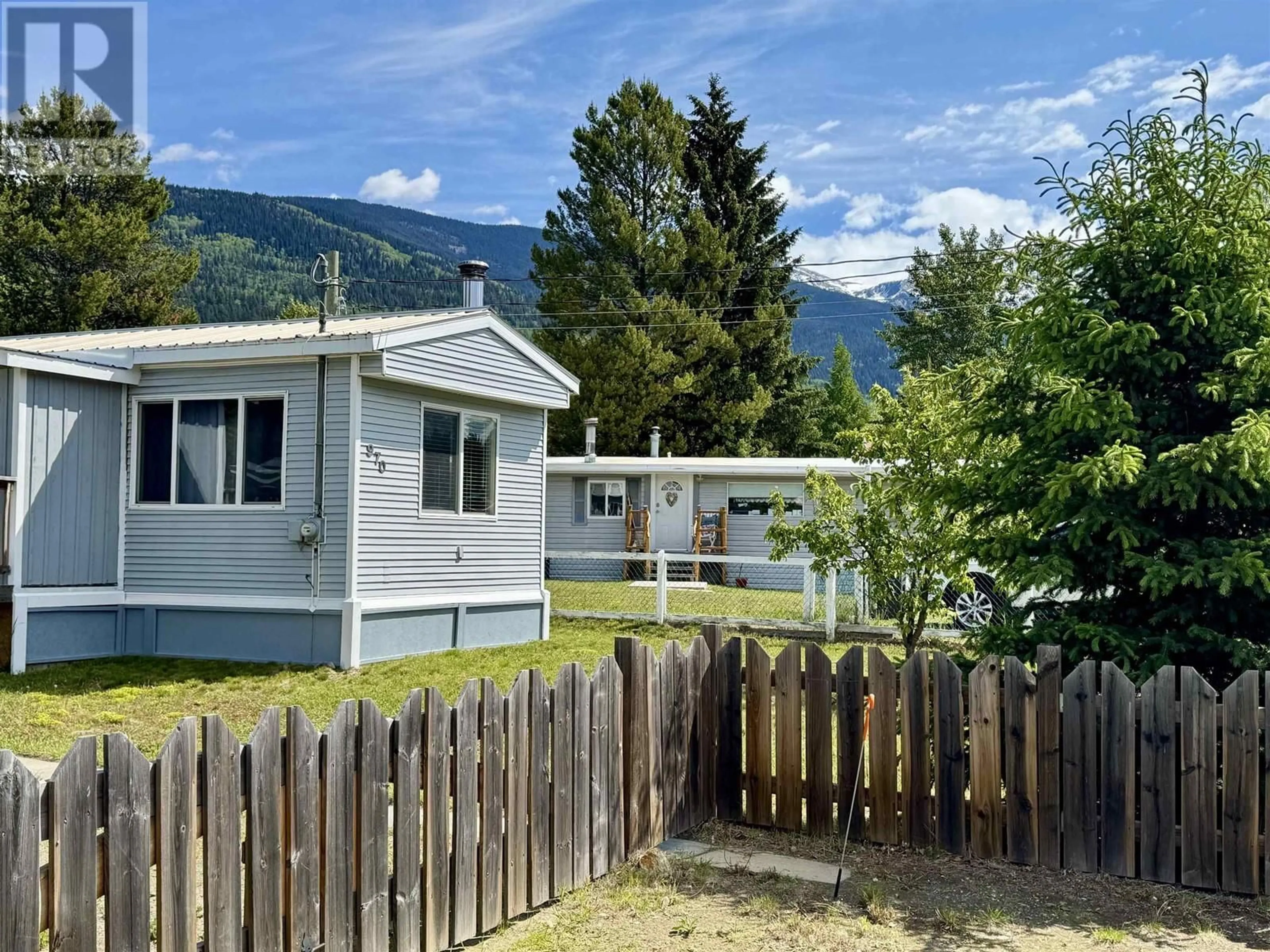 A pic from outside/outdoor area/front of a property/back of a property/a pic from drone, mountain view for 970 BEAVEN CRESCENT, Valemount British Columbia V0E2Z0