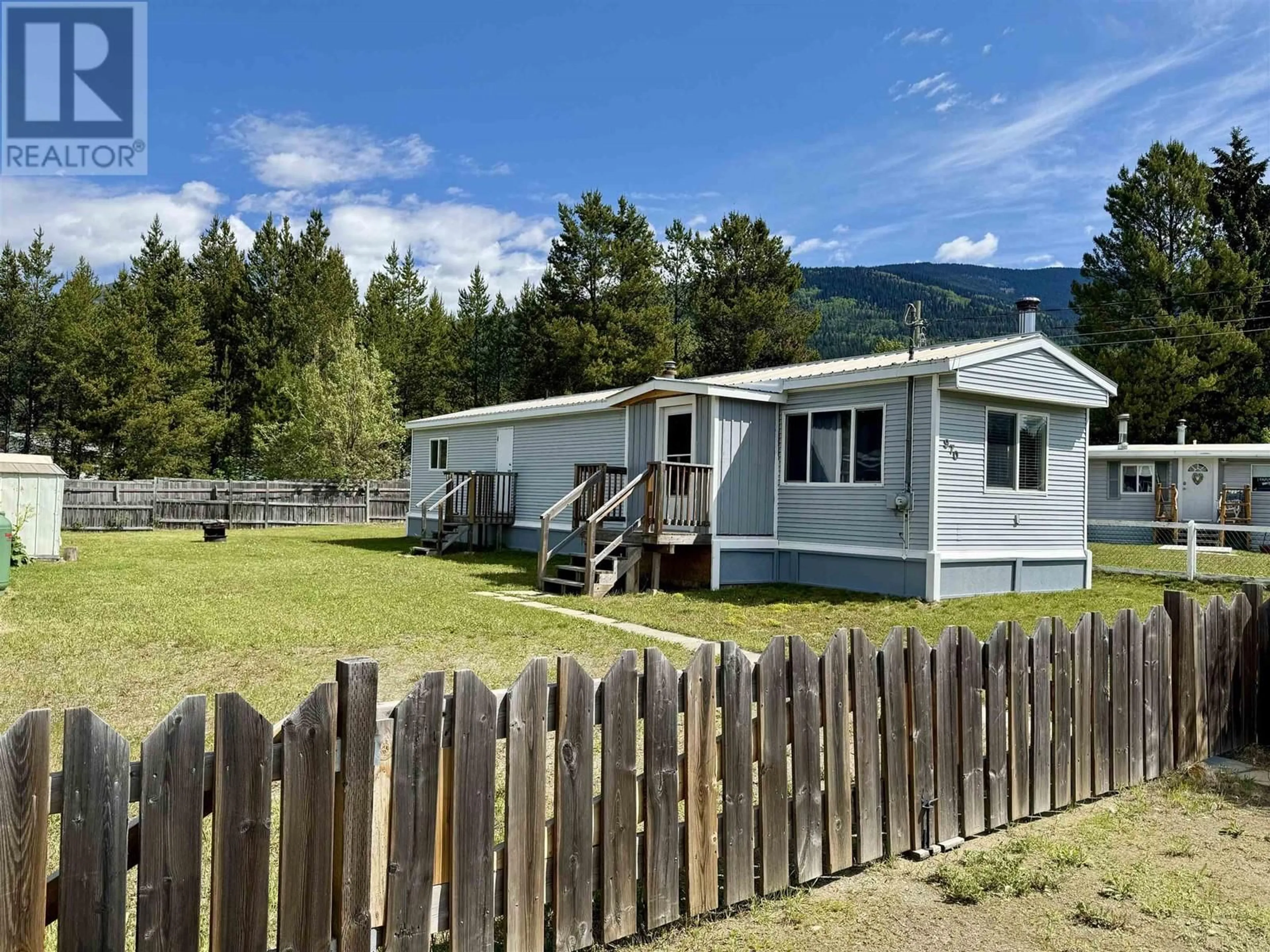 A pic from outside/outdoor area/front of a property/back of a property/a pic from drone, mountain view for 970 BEAVEN CRESCENT, Valemount British Columbia V0E2Z0