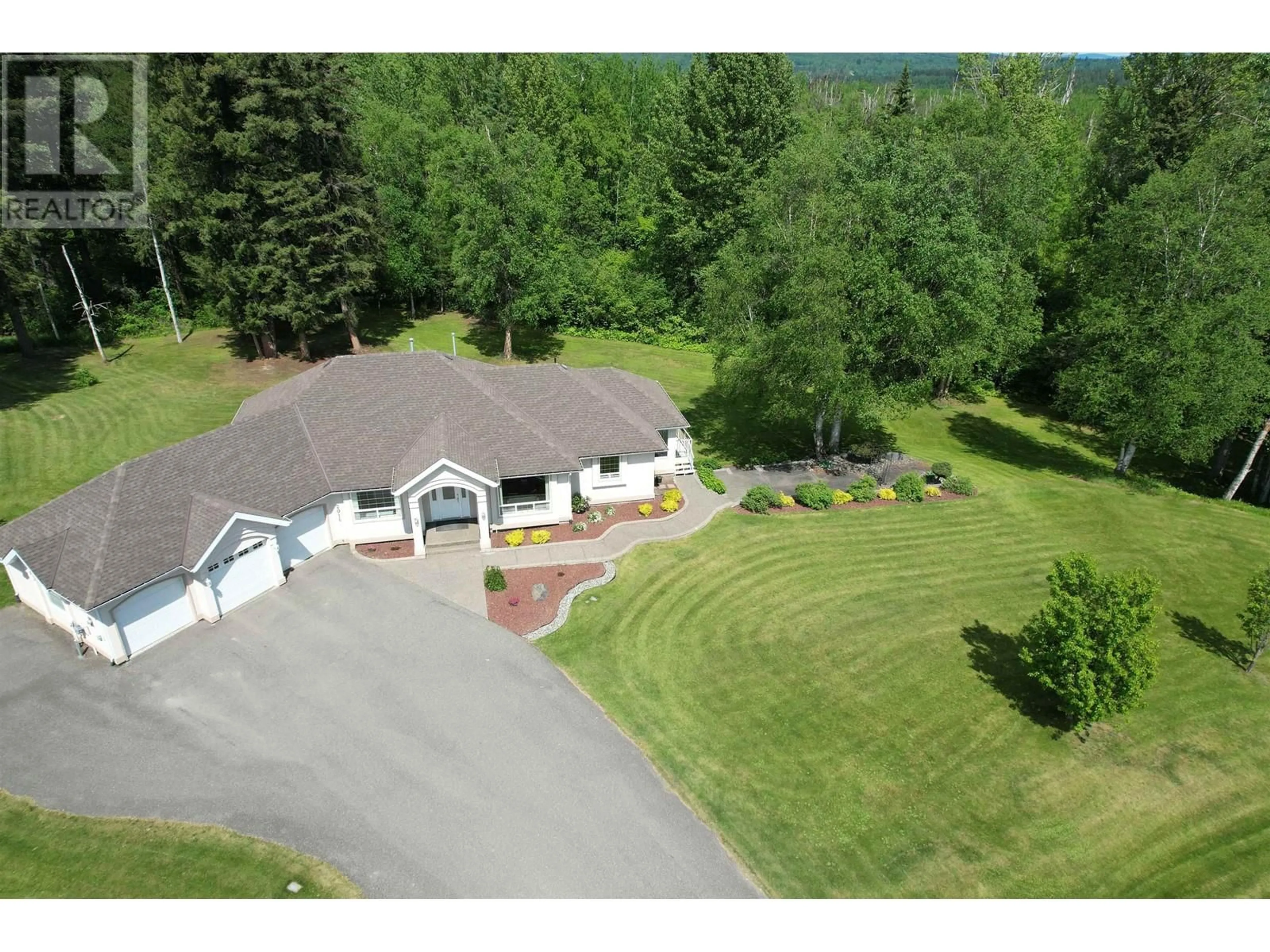 A pic from outside/outdoor area/front of a property/back of a property/a pic from drone, mountain view for 2016 GAMACHE ROAD, Quesnel British Columbia V2J7A8