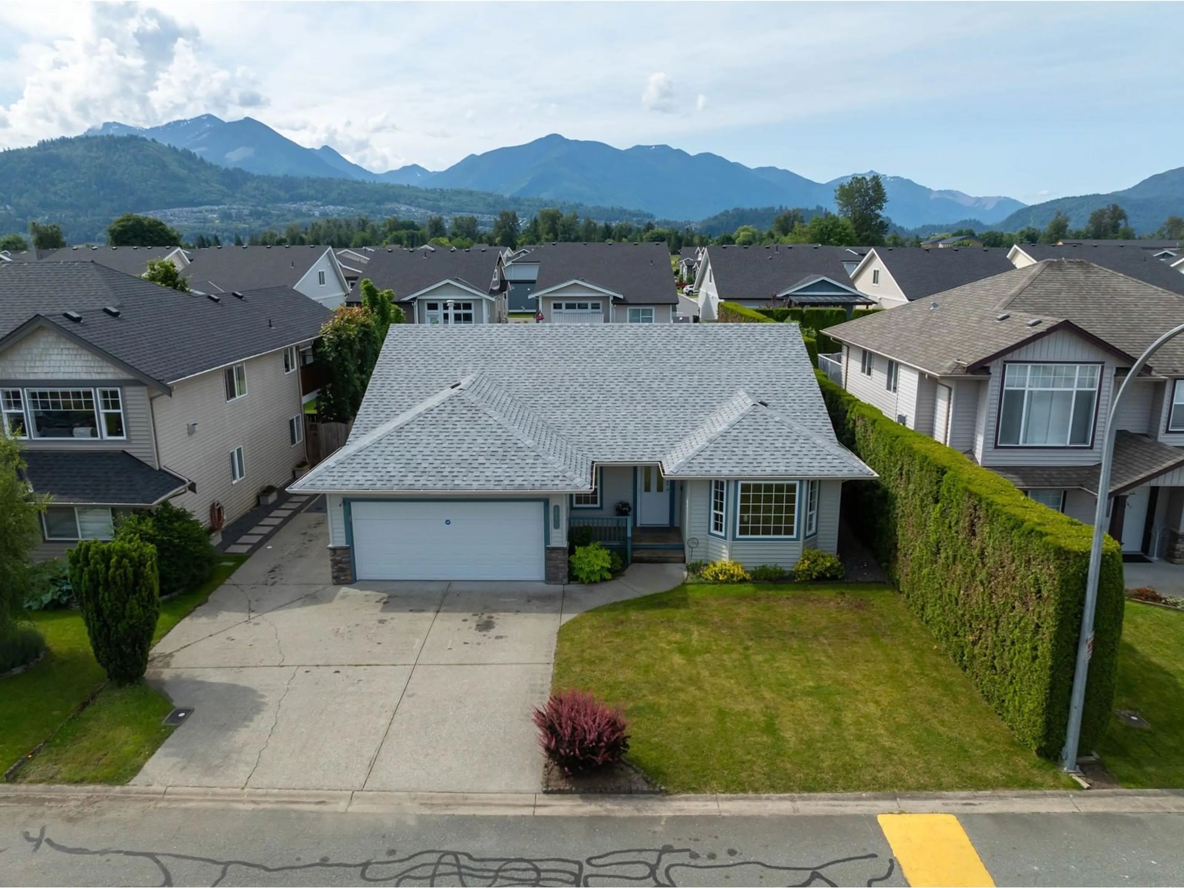 A pic from outside/outdoor area/front of a property/back of a property/a pic from drone, mountain view for 46492 RANCHERO DRIVE, Chilliwack British Columbia V4Z1K3